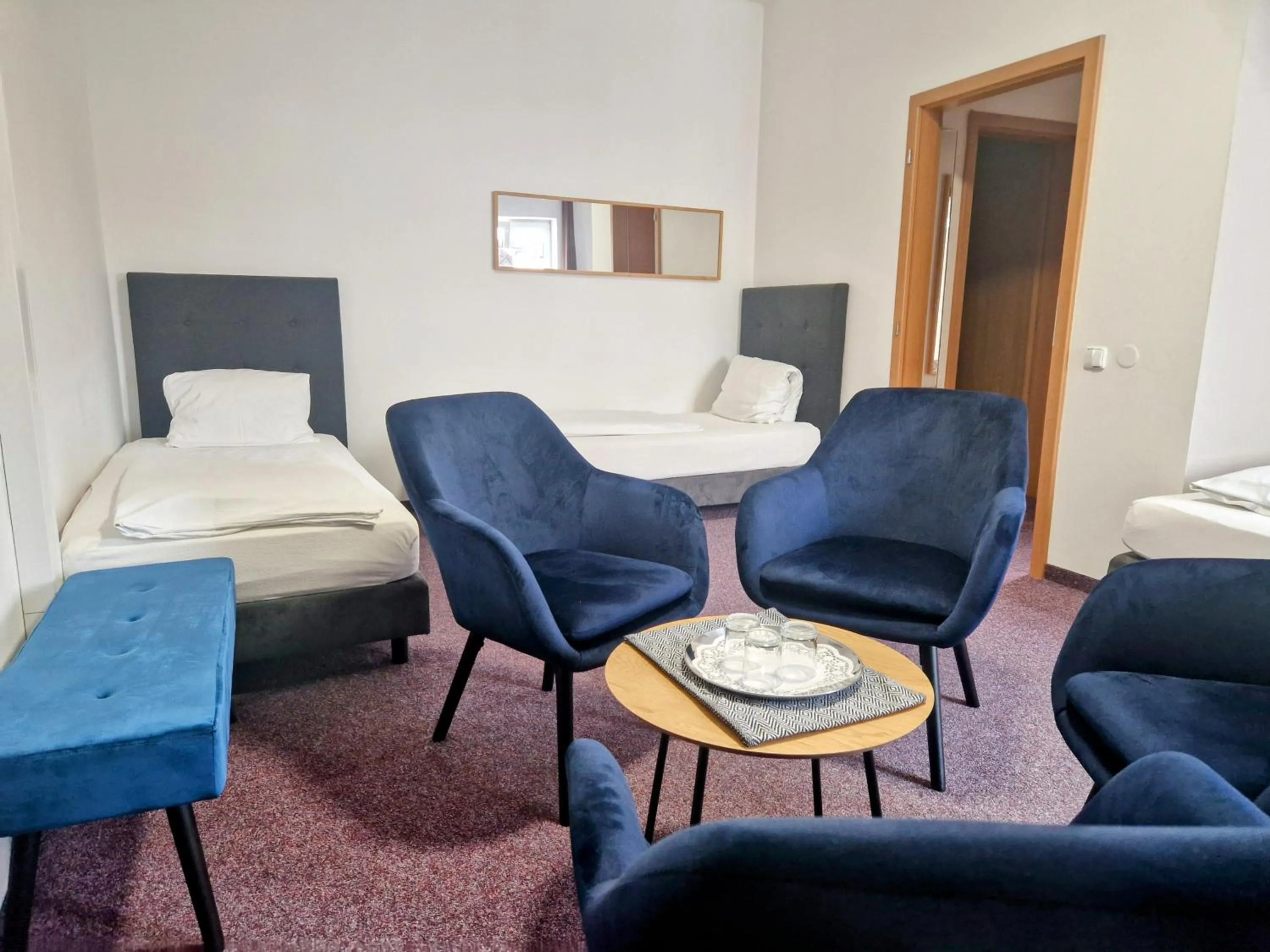 Bed in Family hotel Maxim