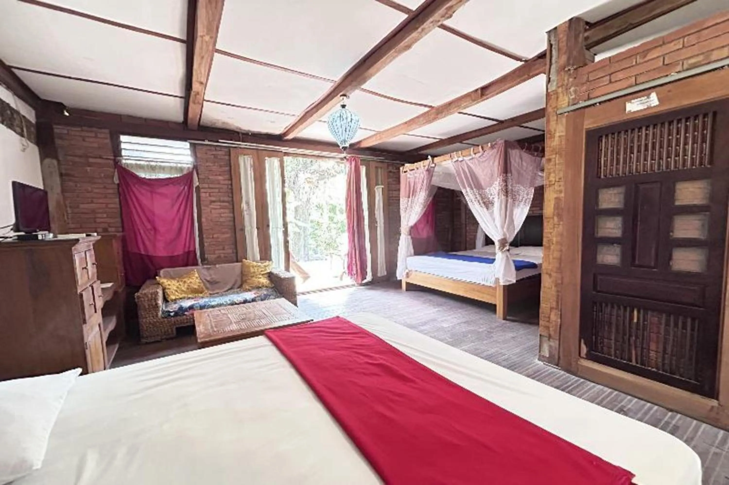 Photo of the whole room, Bed in Hotel O Prawirotaman Near Keraton Yogyakarta Formerly Chez Laelik Guesthouse