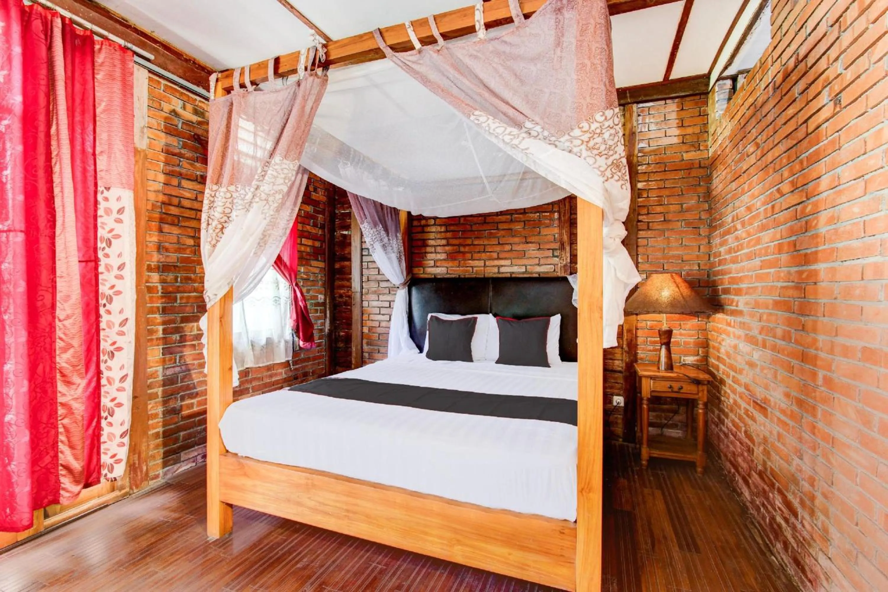 View (from property/room), Bed in Hotel O Prawirotaman Near Keraton Yogyakarta Formerly Chez Laelik Guesthouse