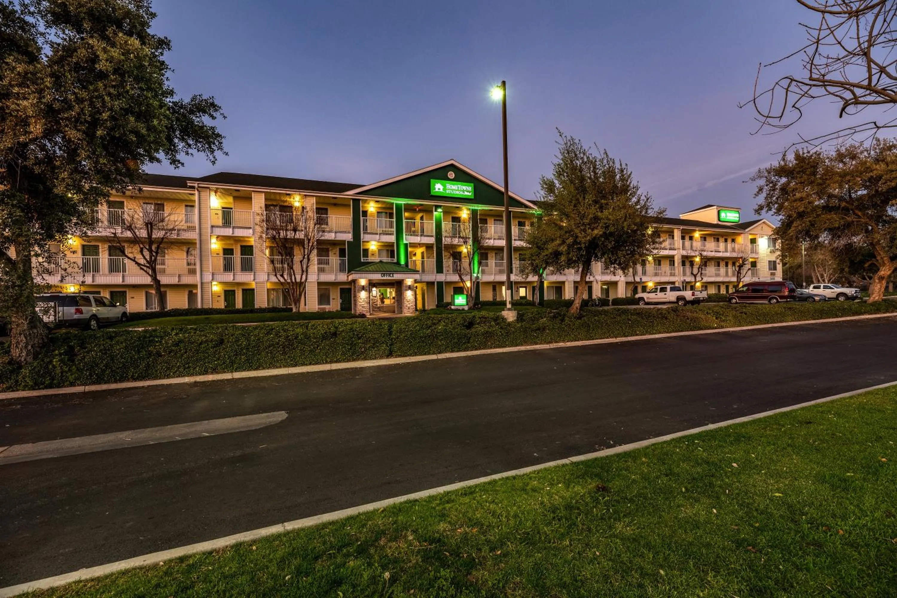 Property building in HomeTowne Studios by Red Roof Fresno - West