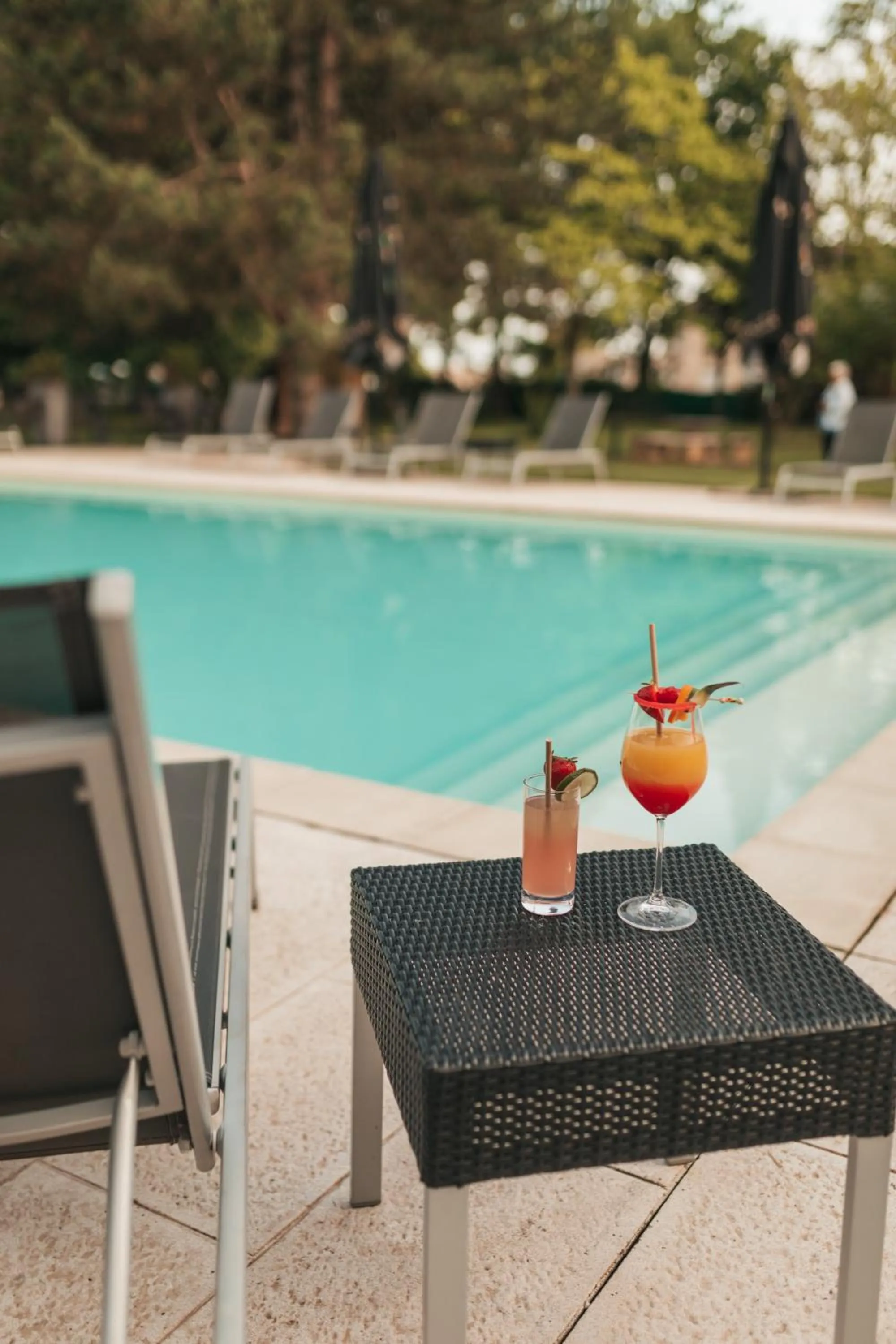 Swimming pool in Le Dracy Hôtel et Spa