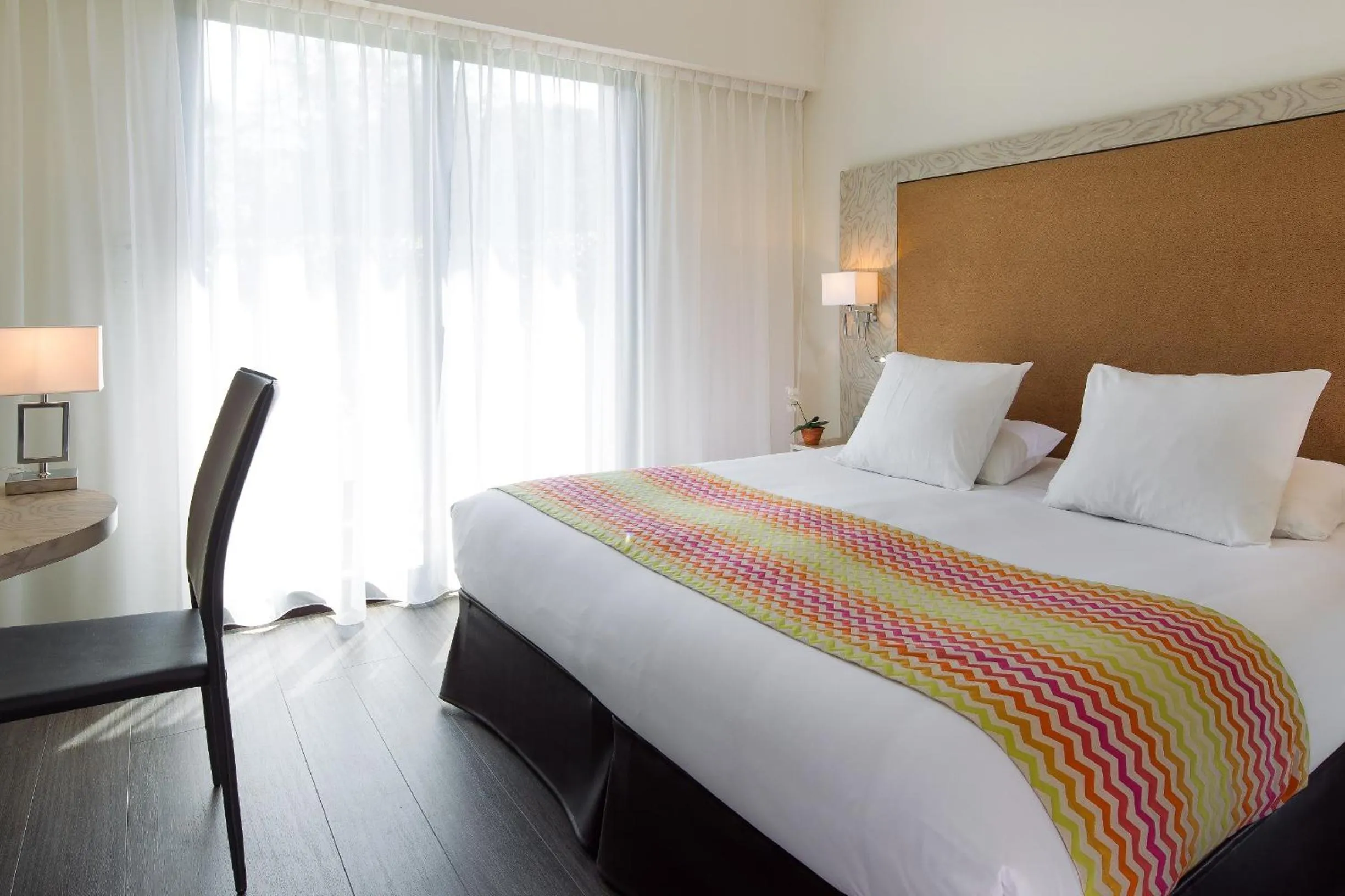 Bed in Le Dracy Hôtel et Spa