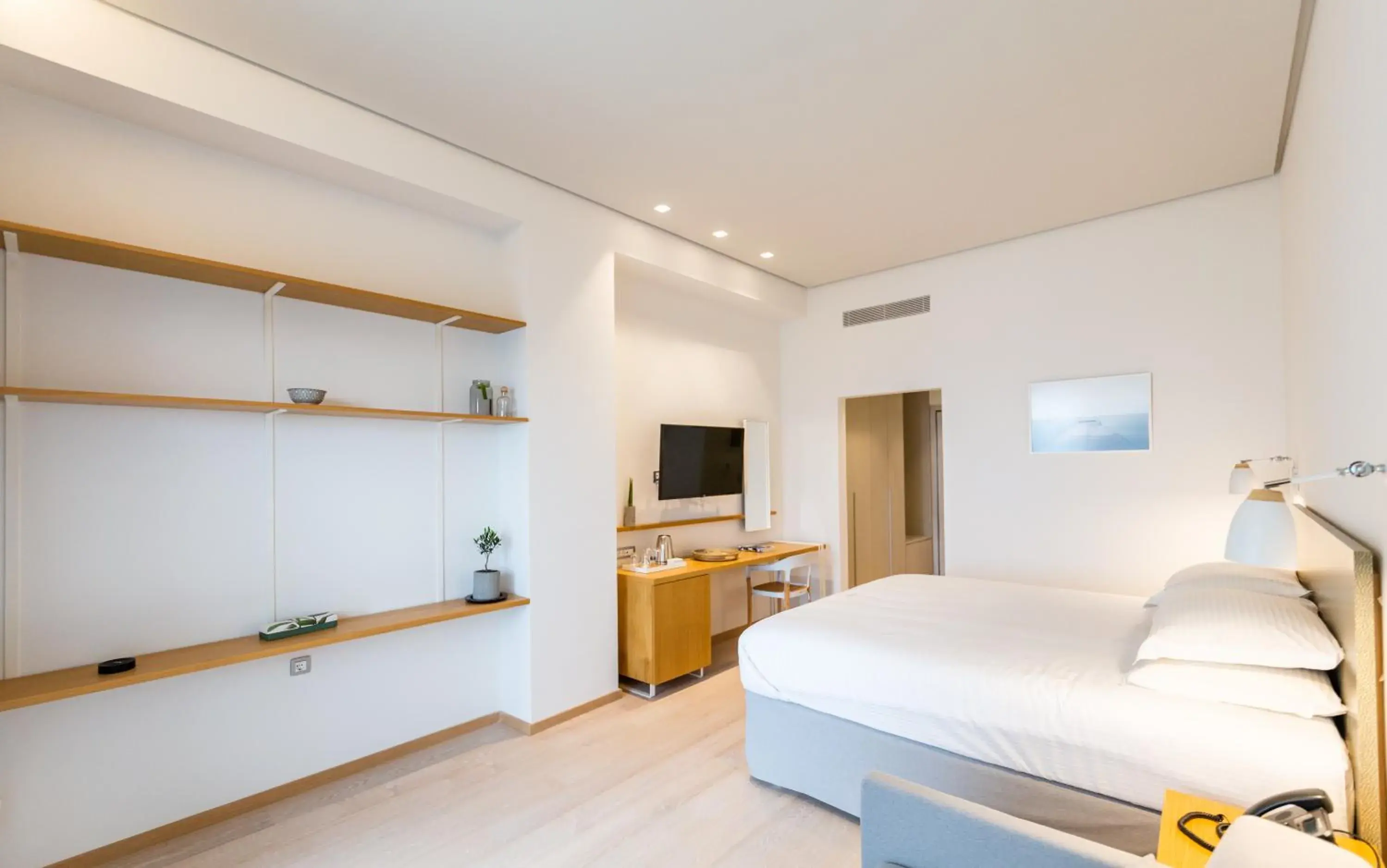Superior Quadruple Room in Messinian Icon Hotel & Suites Superior Quadruple Room in Messinian Icon Hotel & Suites
