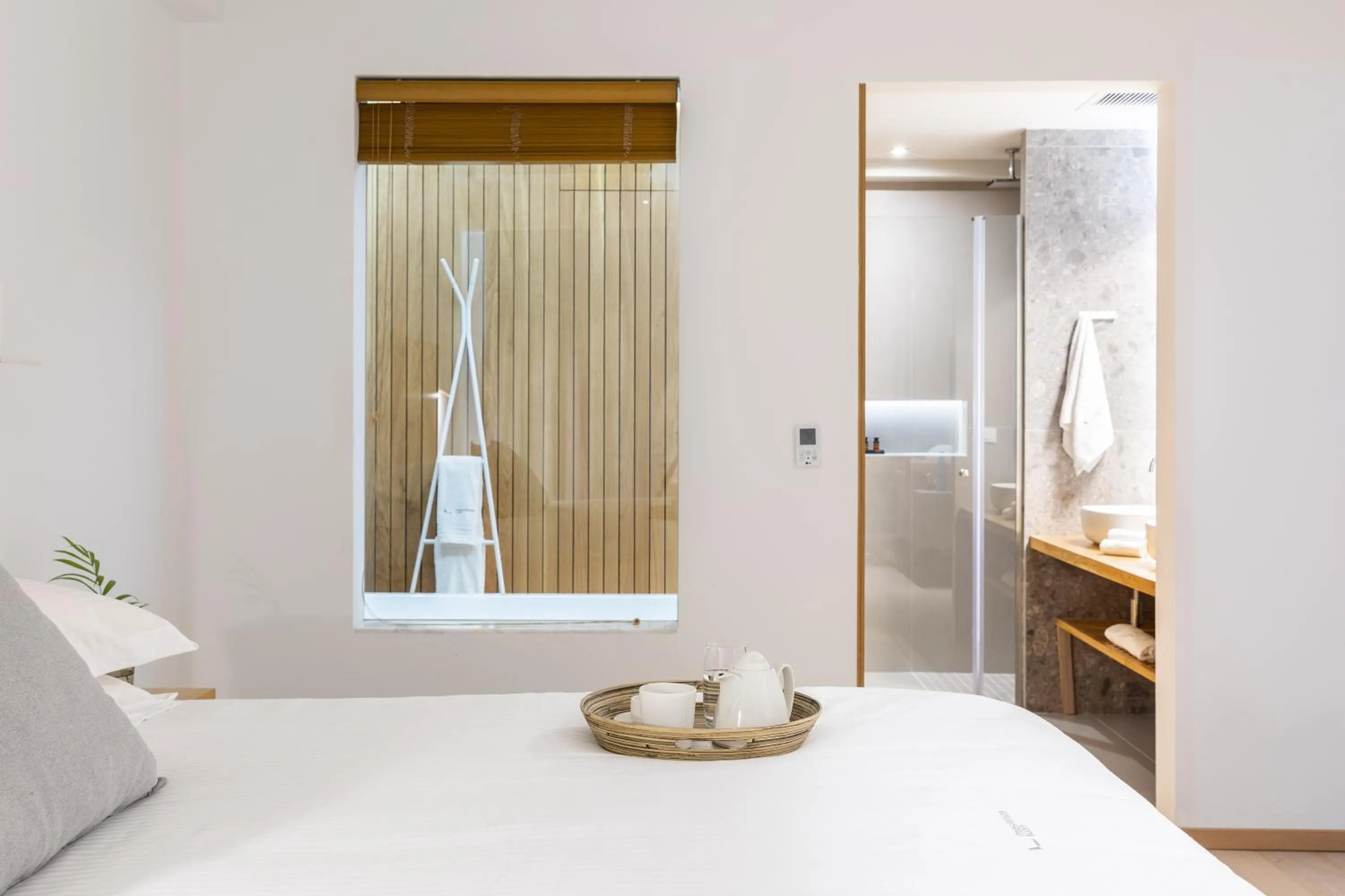 Bed in Messinian Icon Hotel & Suites