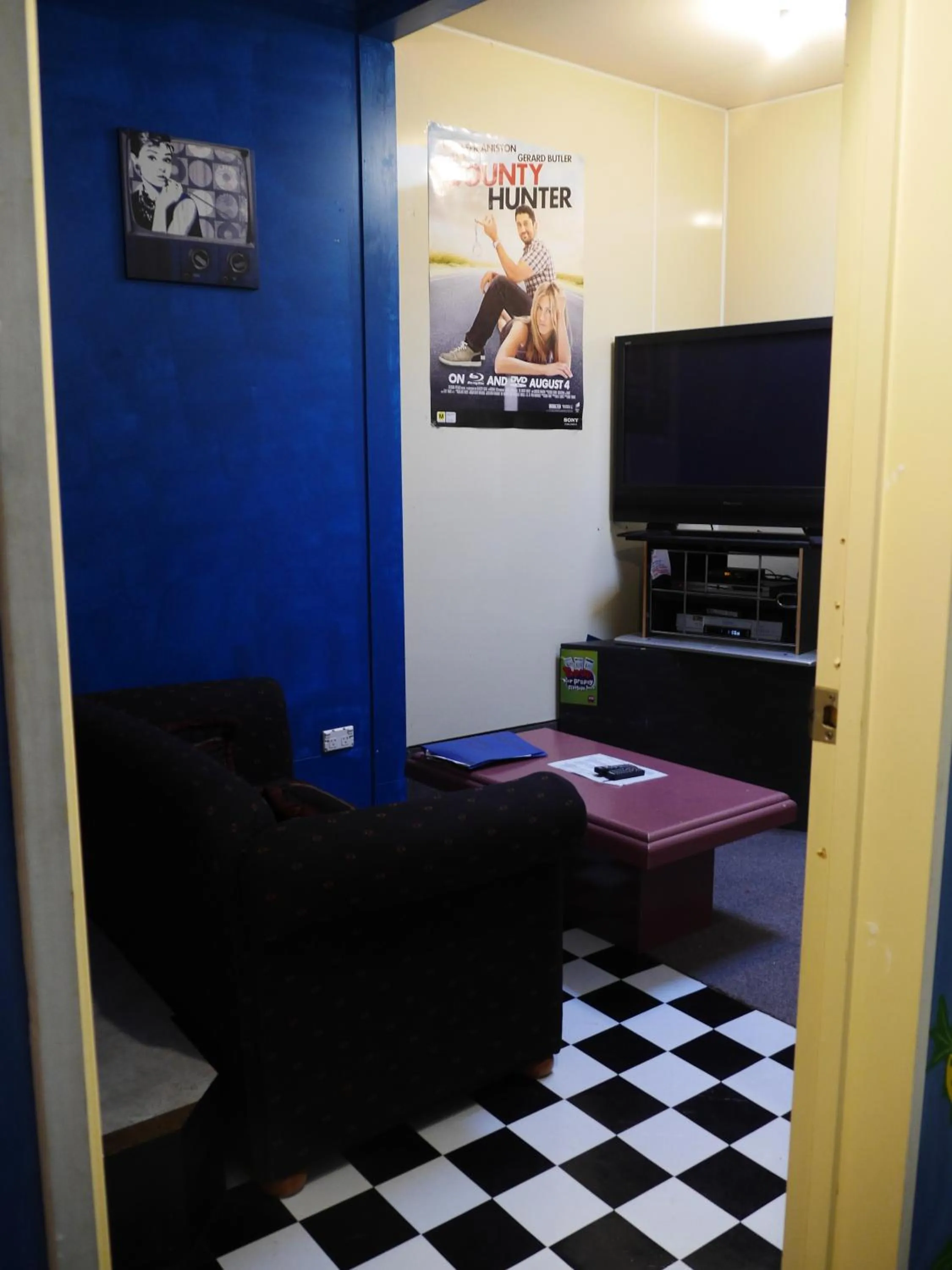 Communal lounge/ TV room in Atlantis Backpackers