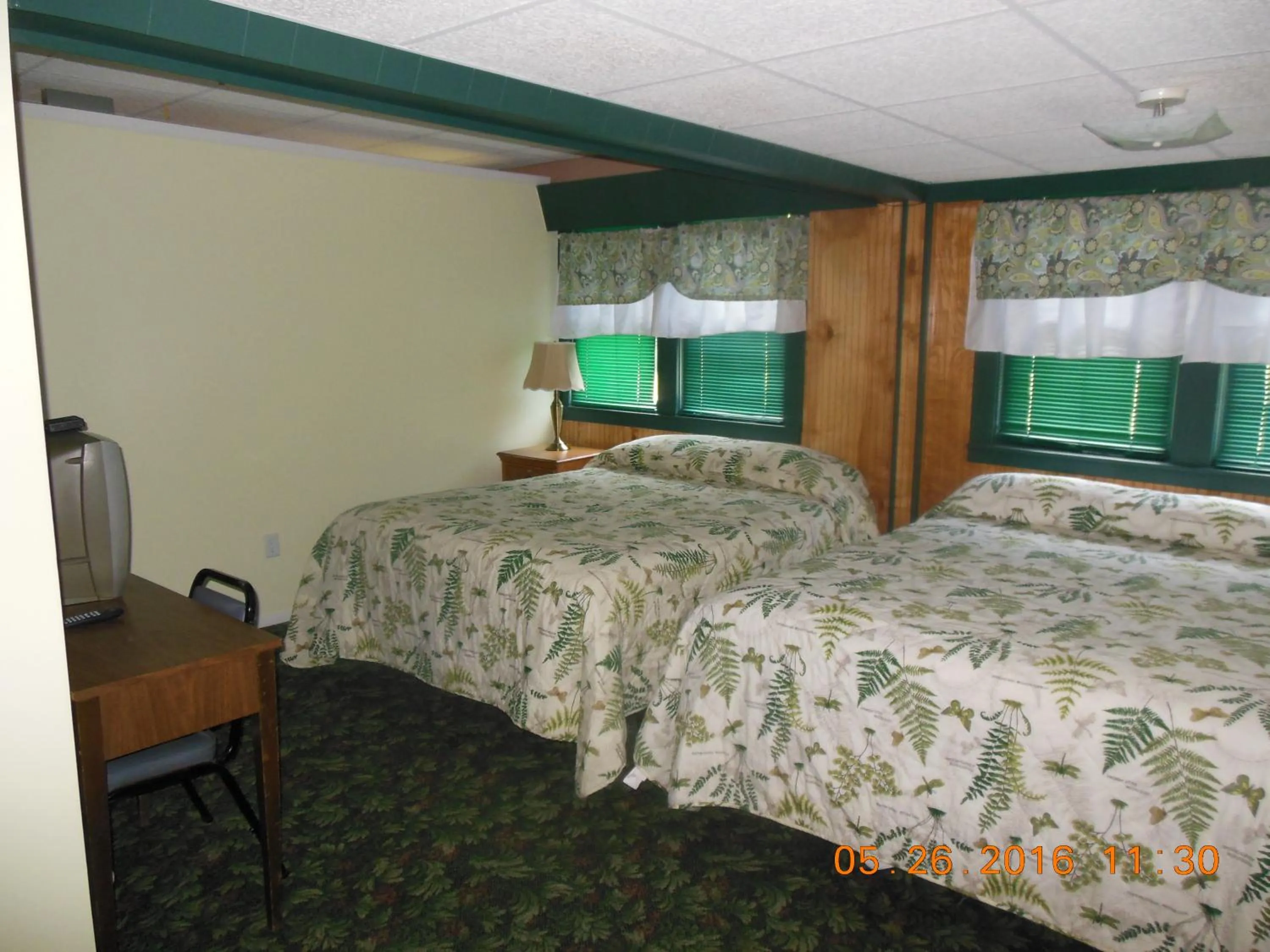 Bed in Evergreen Motel
