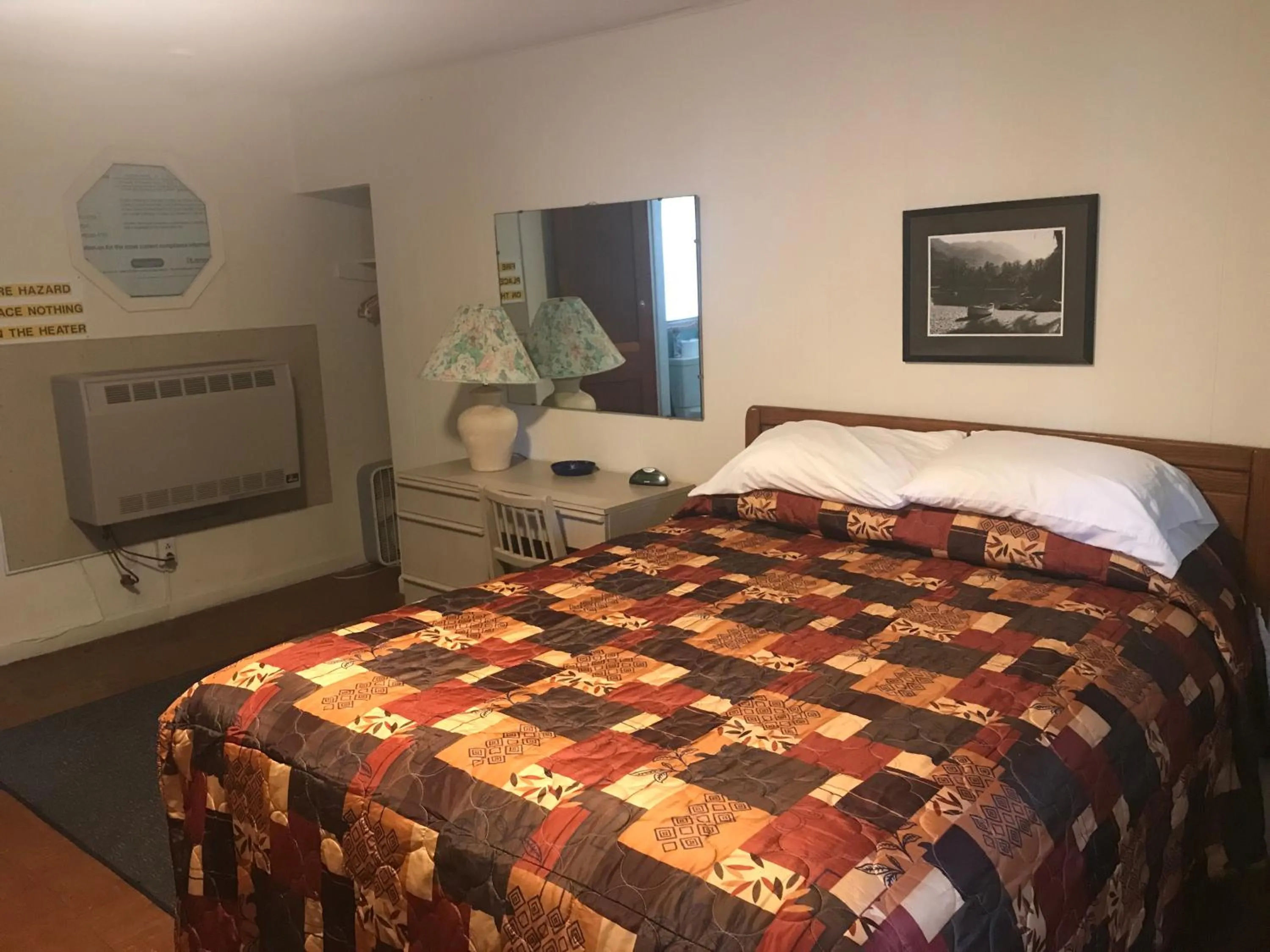 Bed in Evergreen Motel