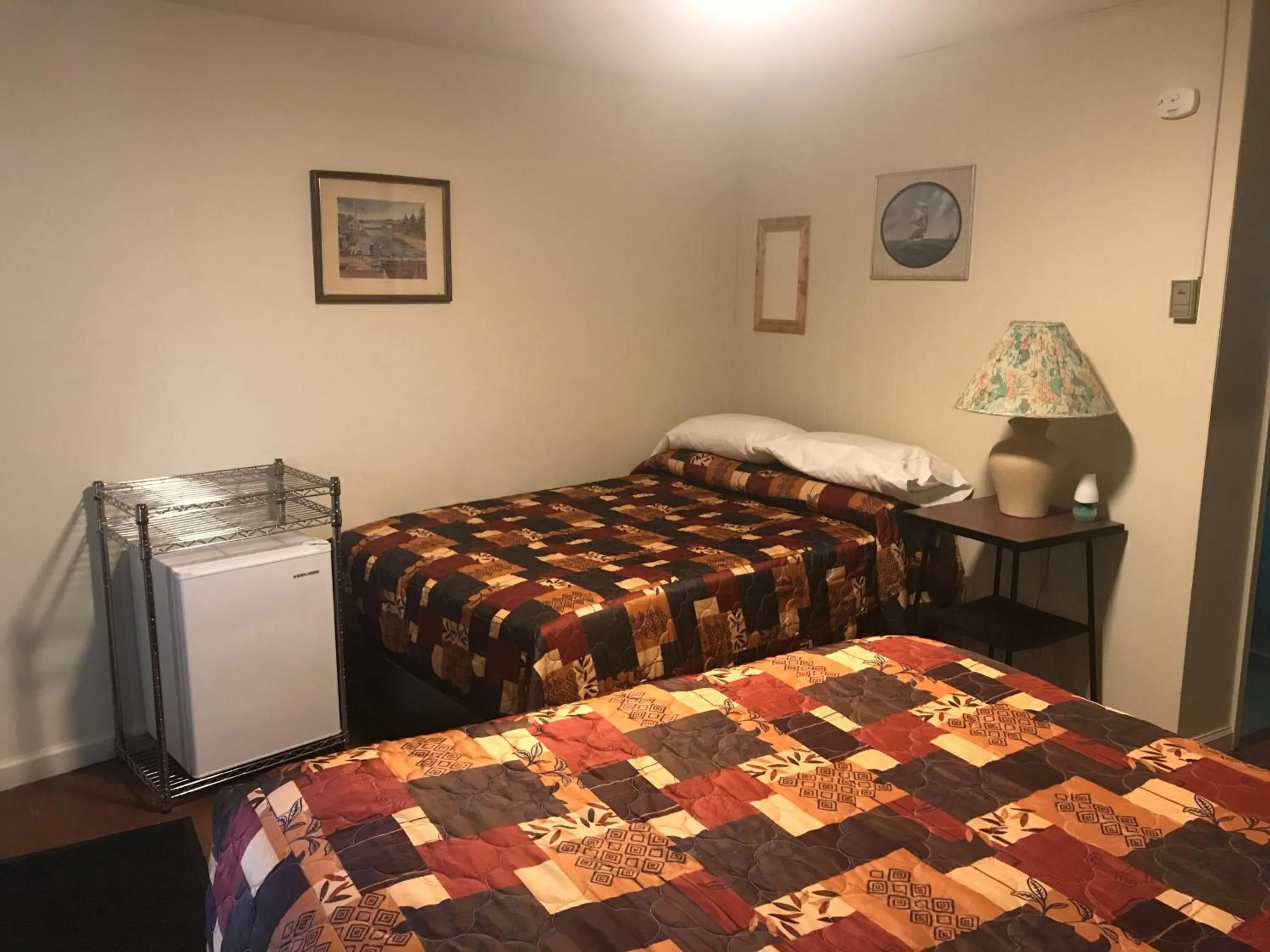 Bed in Evergreen Motel