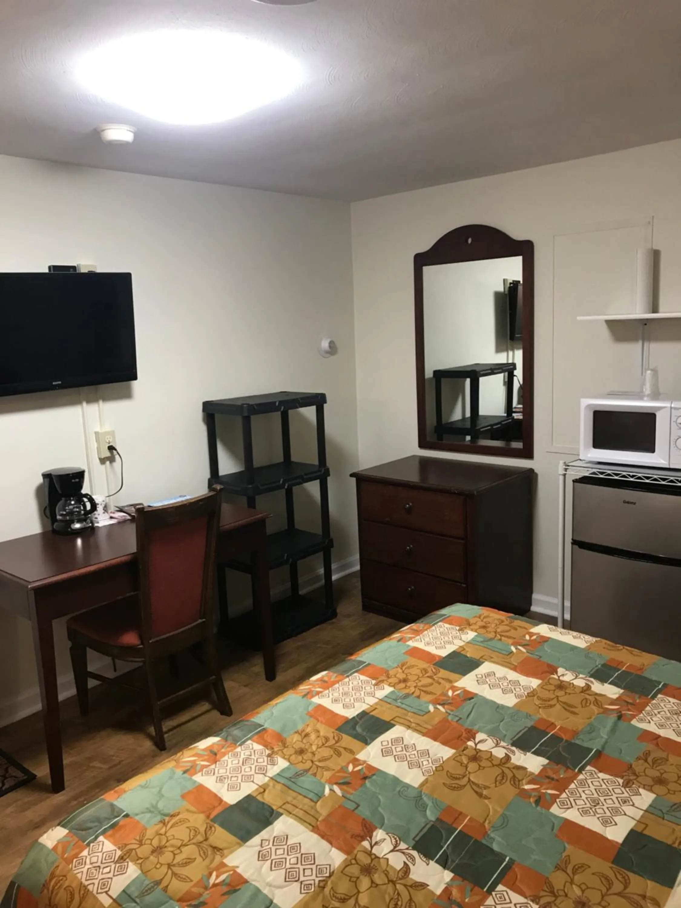 Bed in Evergreen Motel