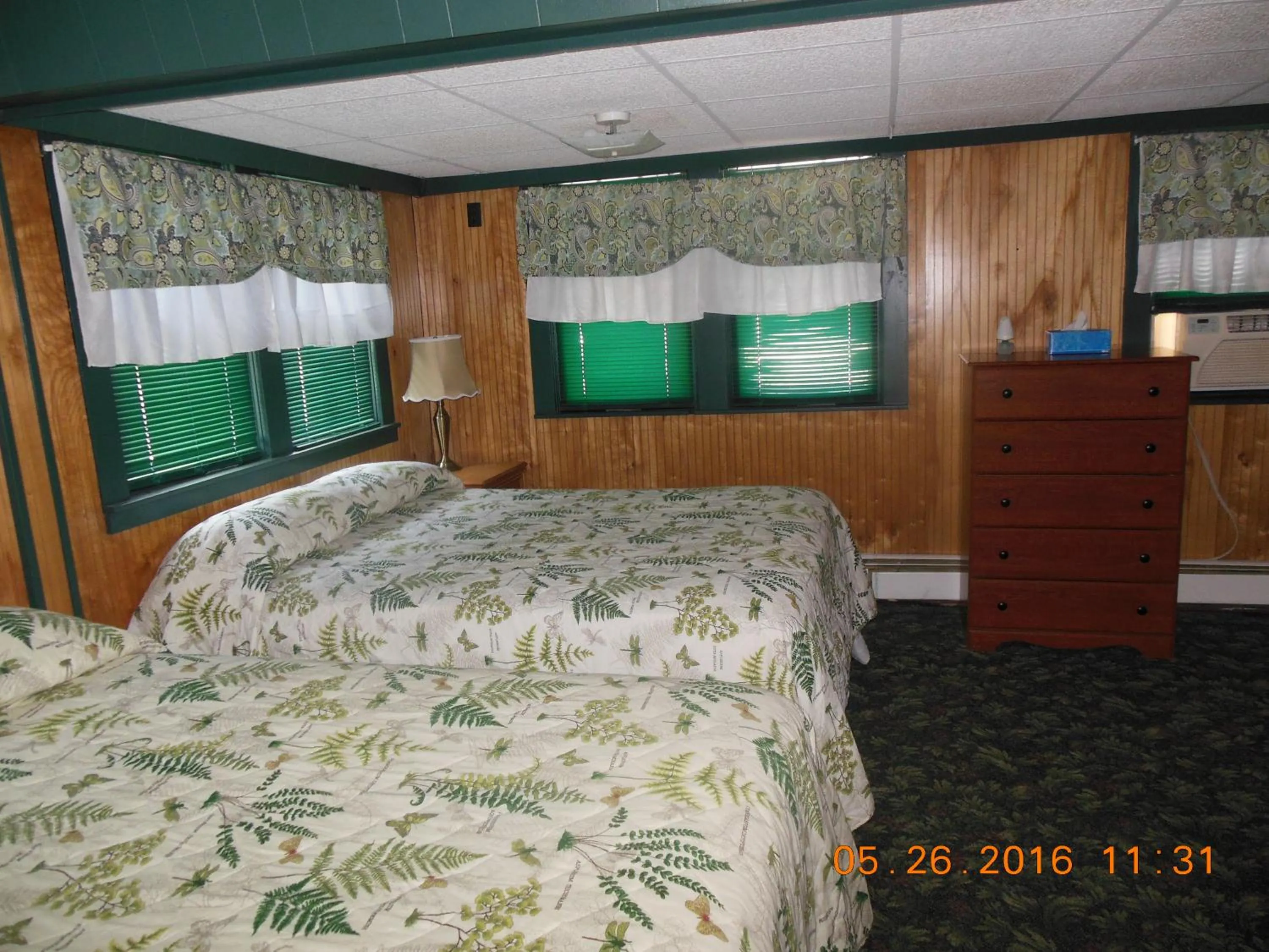 Bed in Evergreen Motel
