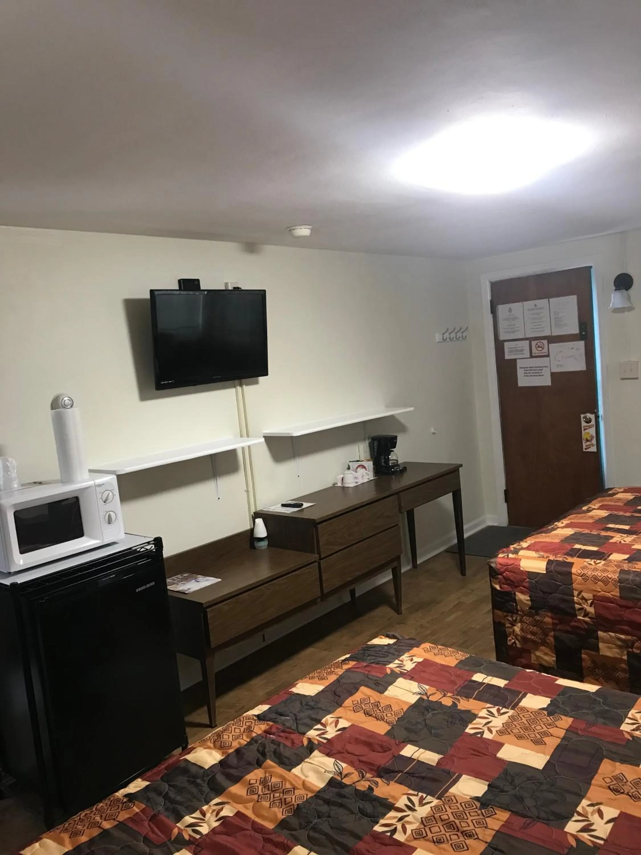 Bed in Evergreen Motel