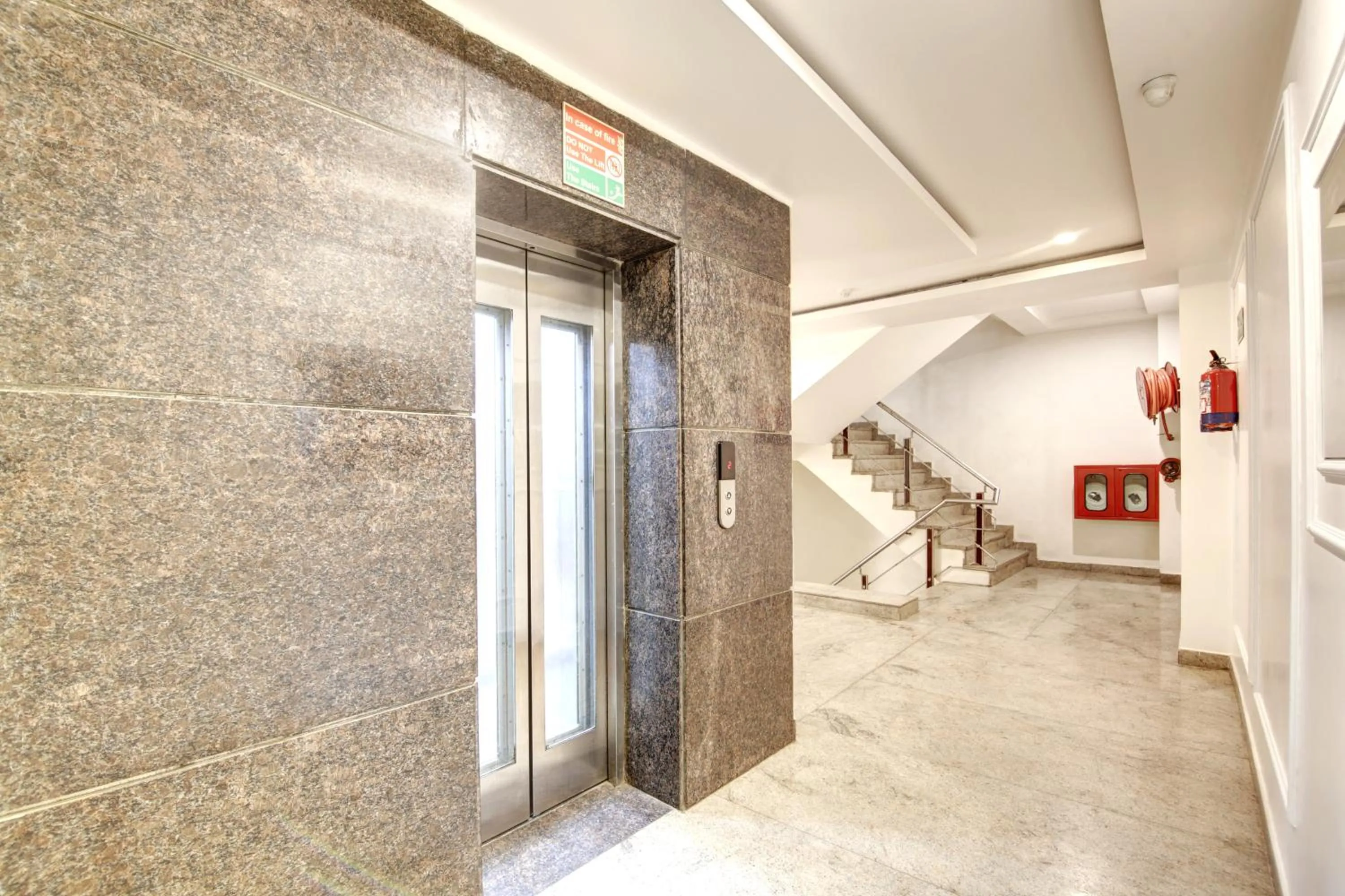 elevator in Hotel All Iz Well - Traveller Choice Award winner 2025