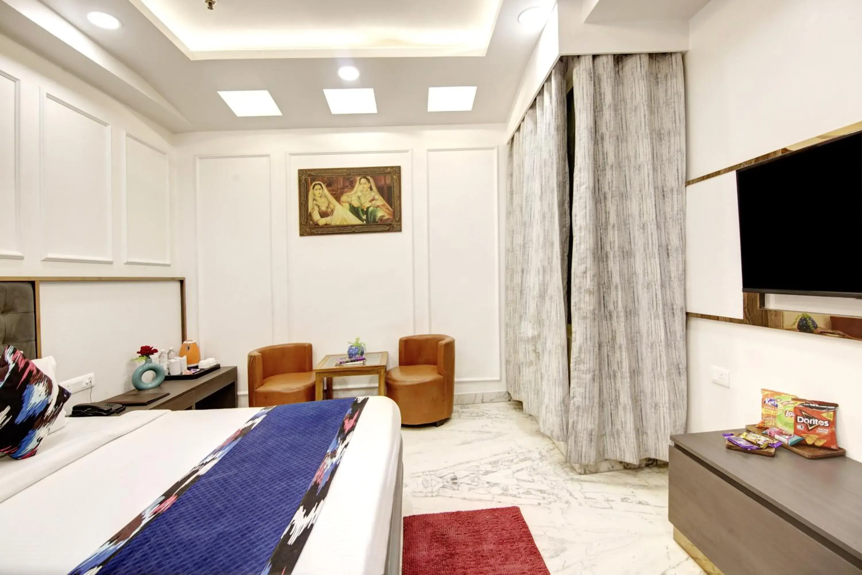 Communal lounge/ TV room, Bed in Hotel All Iz Well - Just a min away from New Delhi Railway Station Communal lounge/ TV room, Bed in Hotel All Iz Well - Just a min away from New Delhi Railway Station