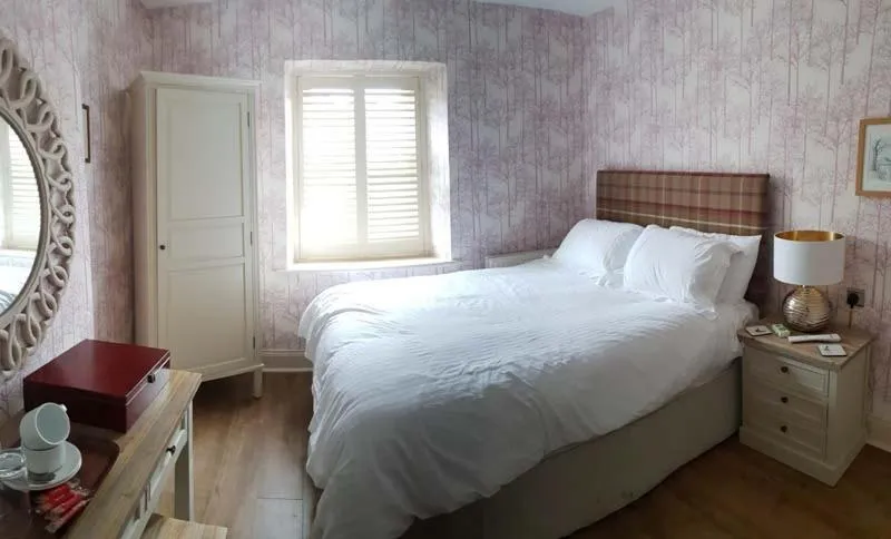 Bed in The Queen Catherine Hotel