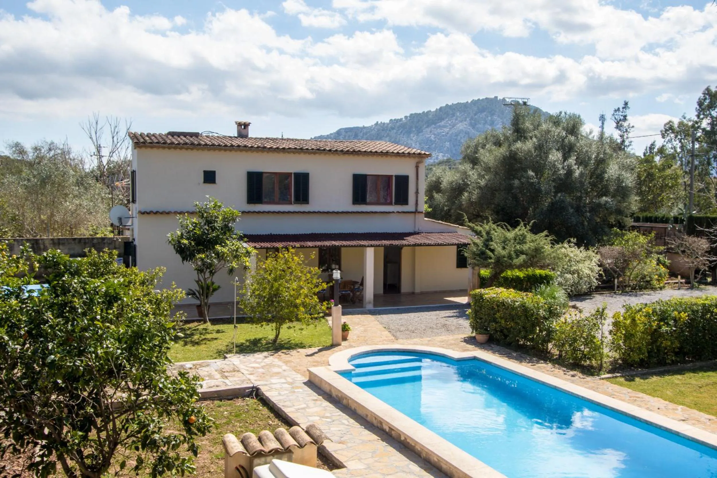 Swimming pool in Villa La Palmera By homevillas360