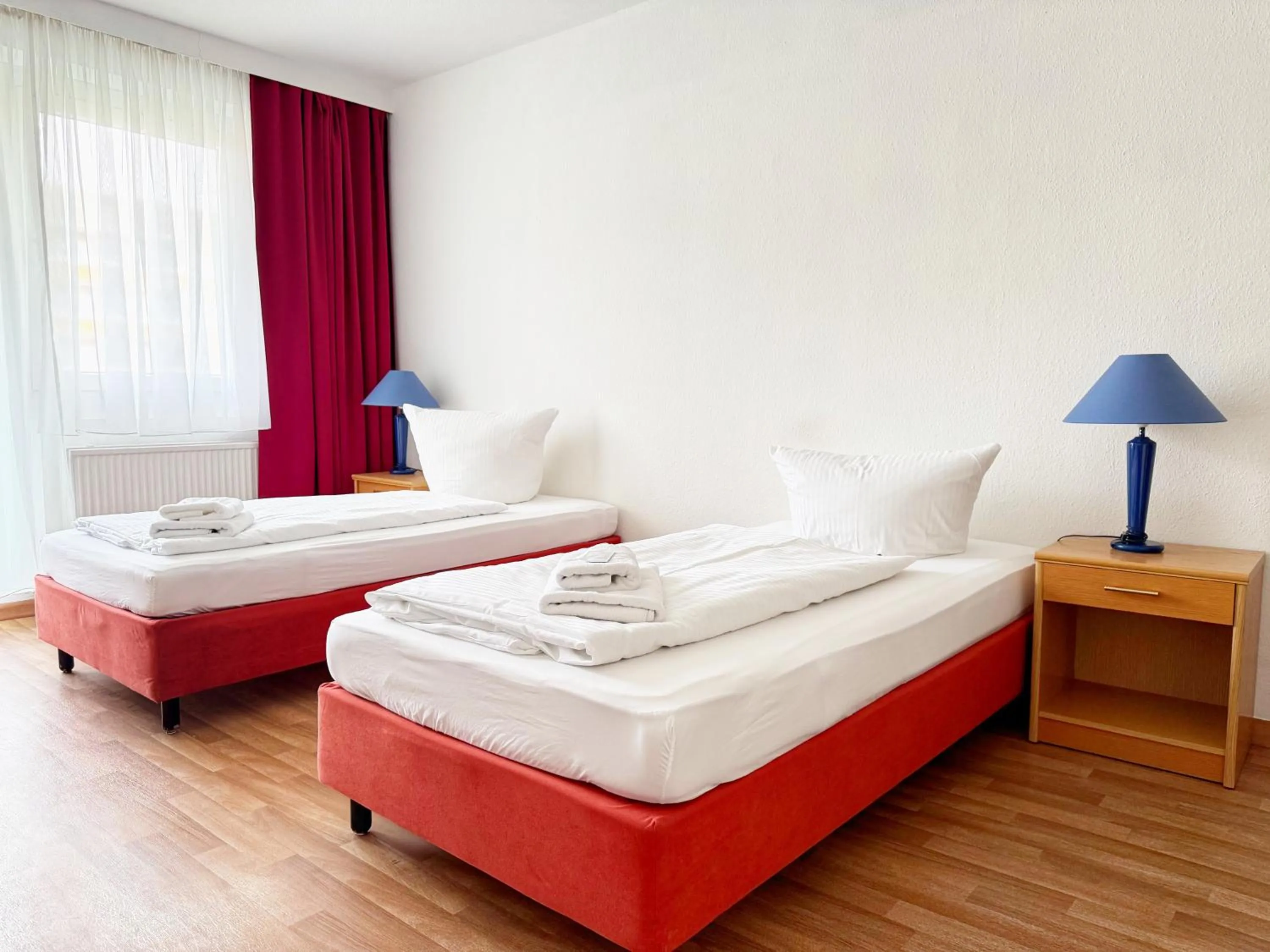 Bed in Alpha Apparthotel leipzig-Rötha