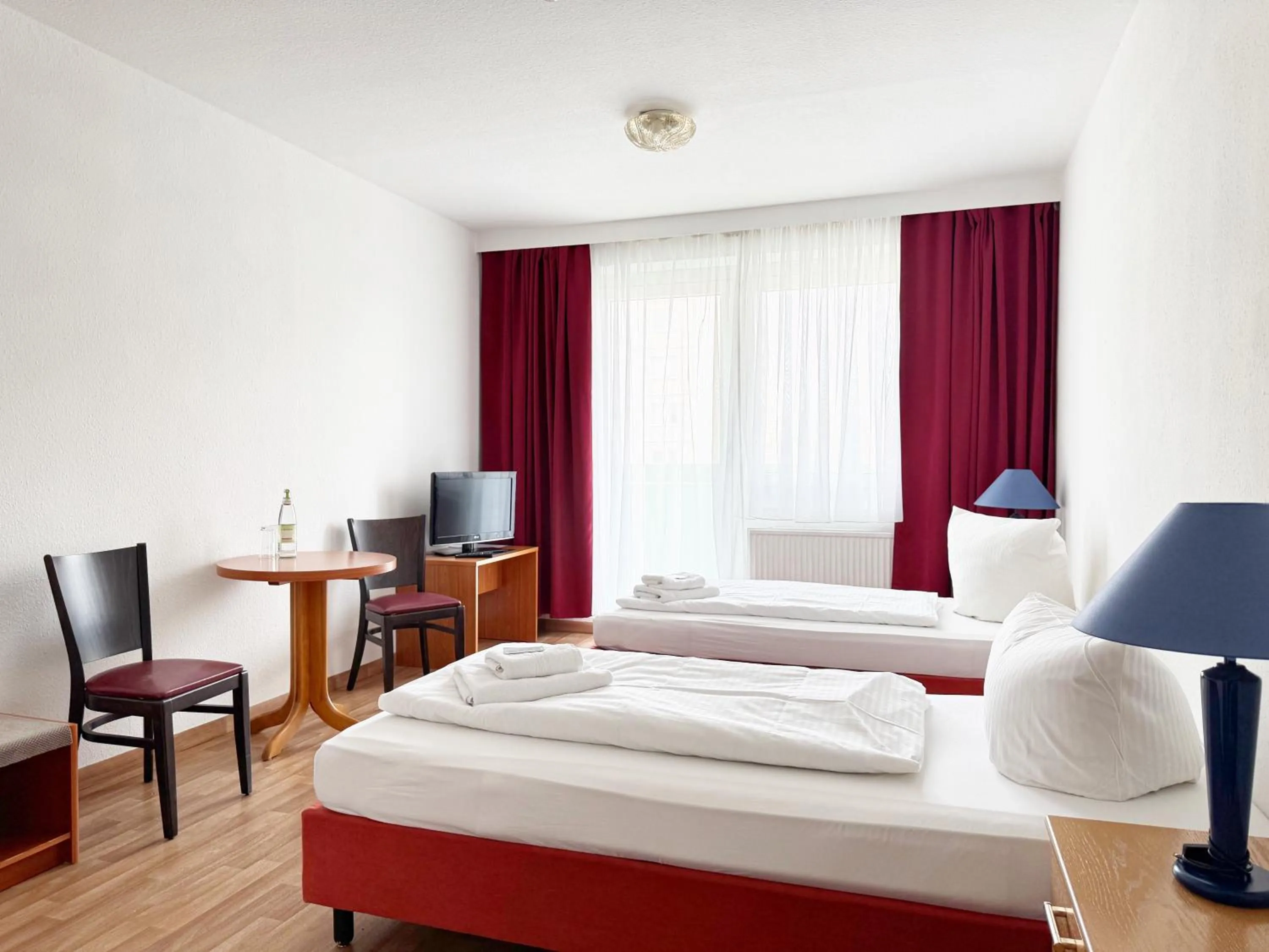 Bed in Alpha Apparthotel leipzig-Rötha