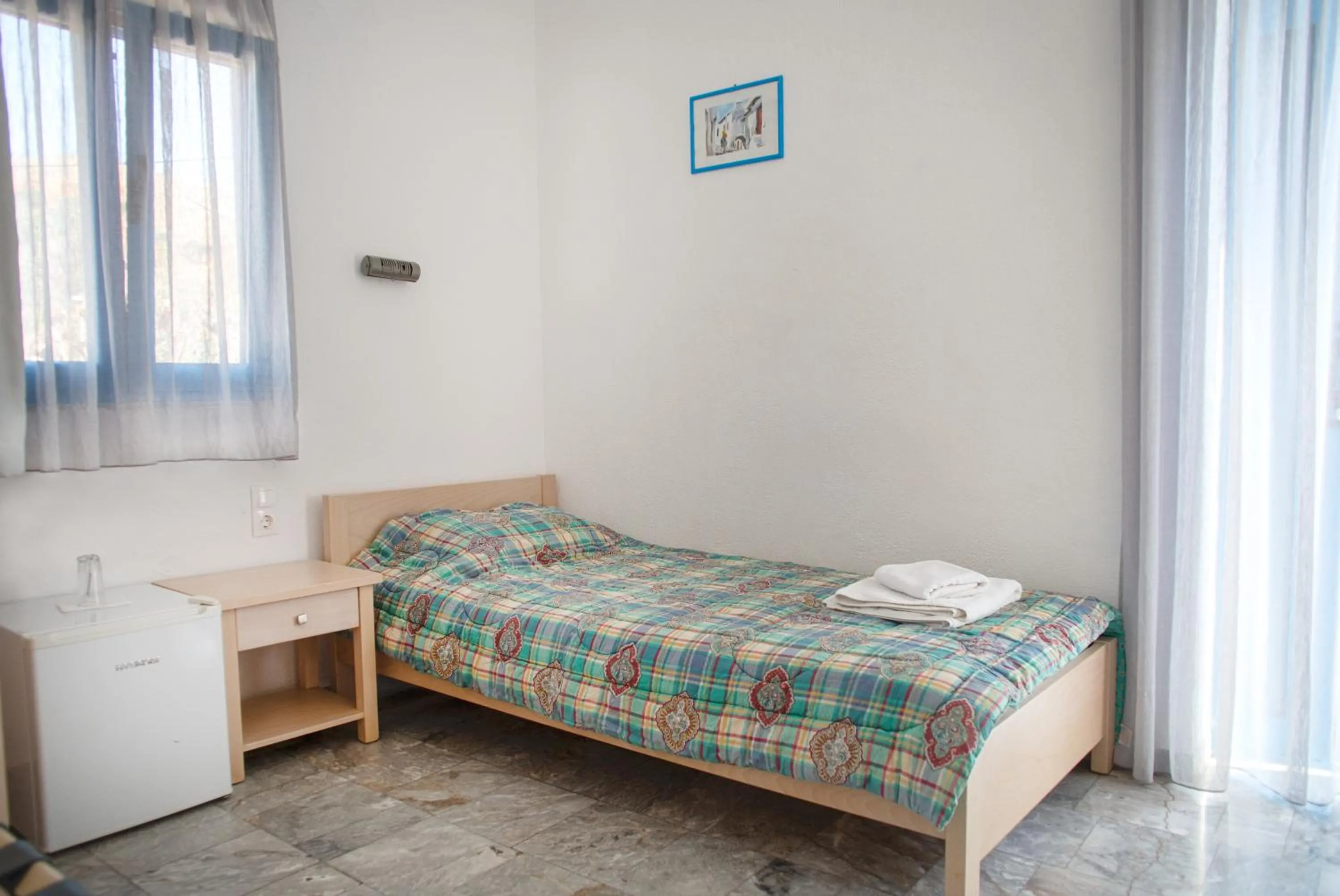 Photo of the whole room, Bed in Agios Pavlos Hotel
