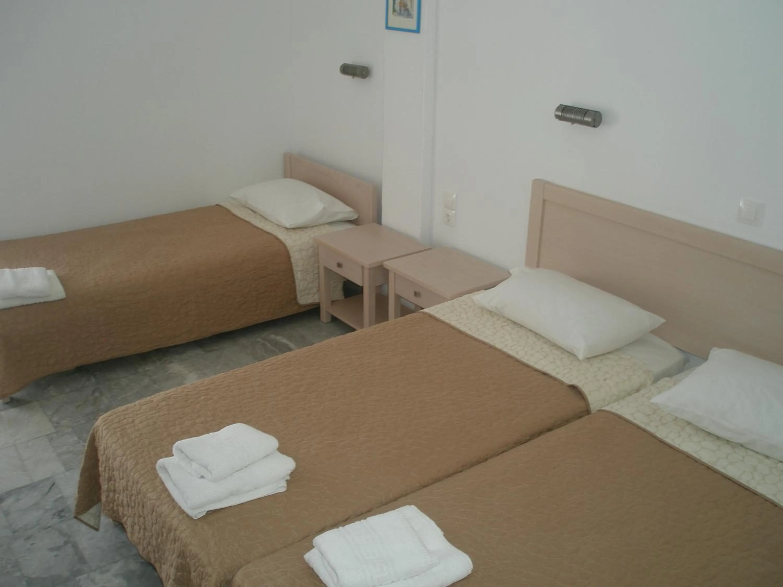Bed in Agios Pavlos Hotel