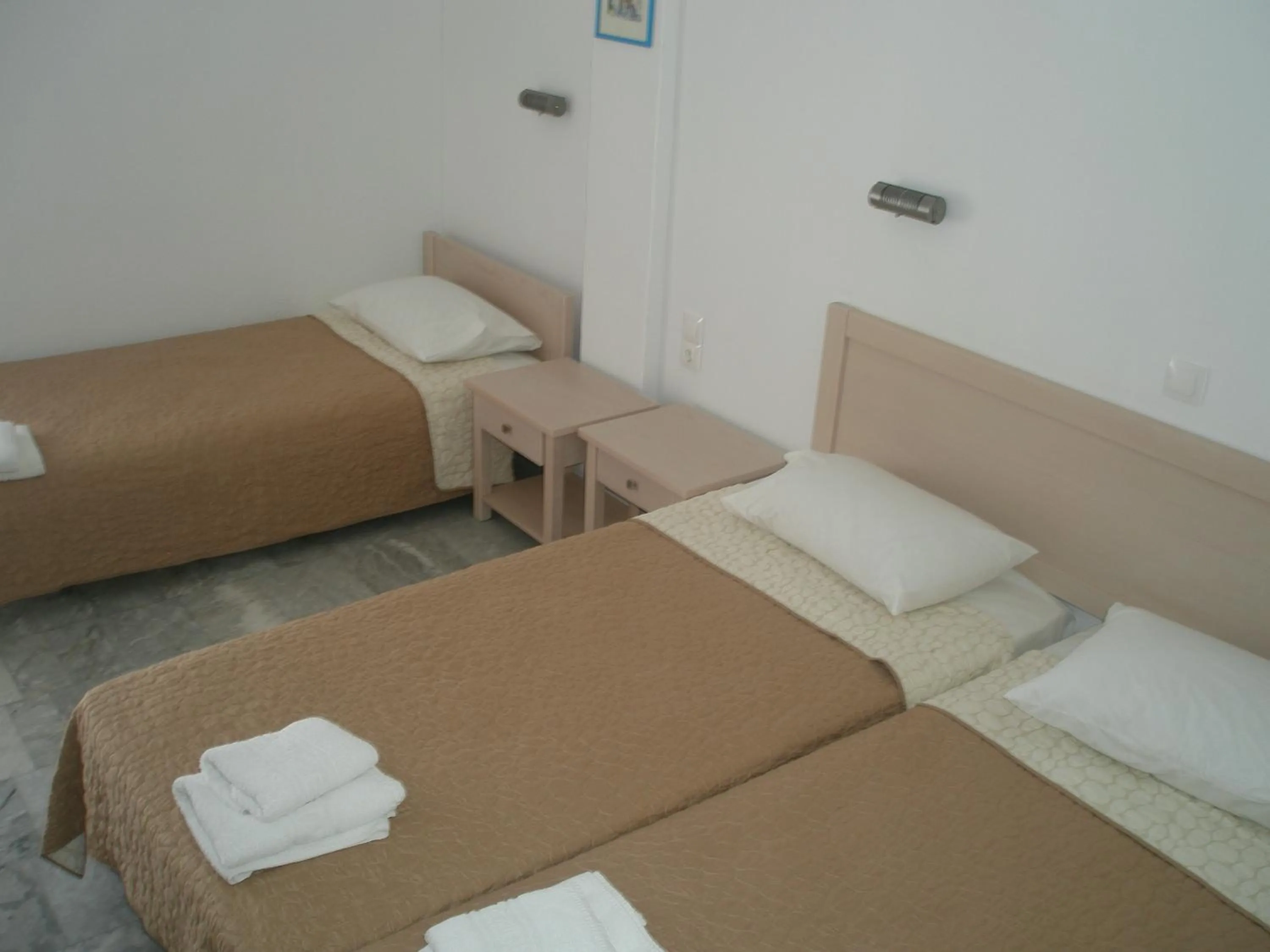 Bed in Agios Pavlos Hotel