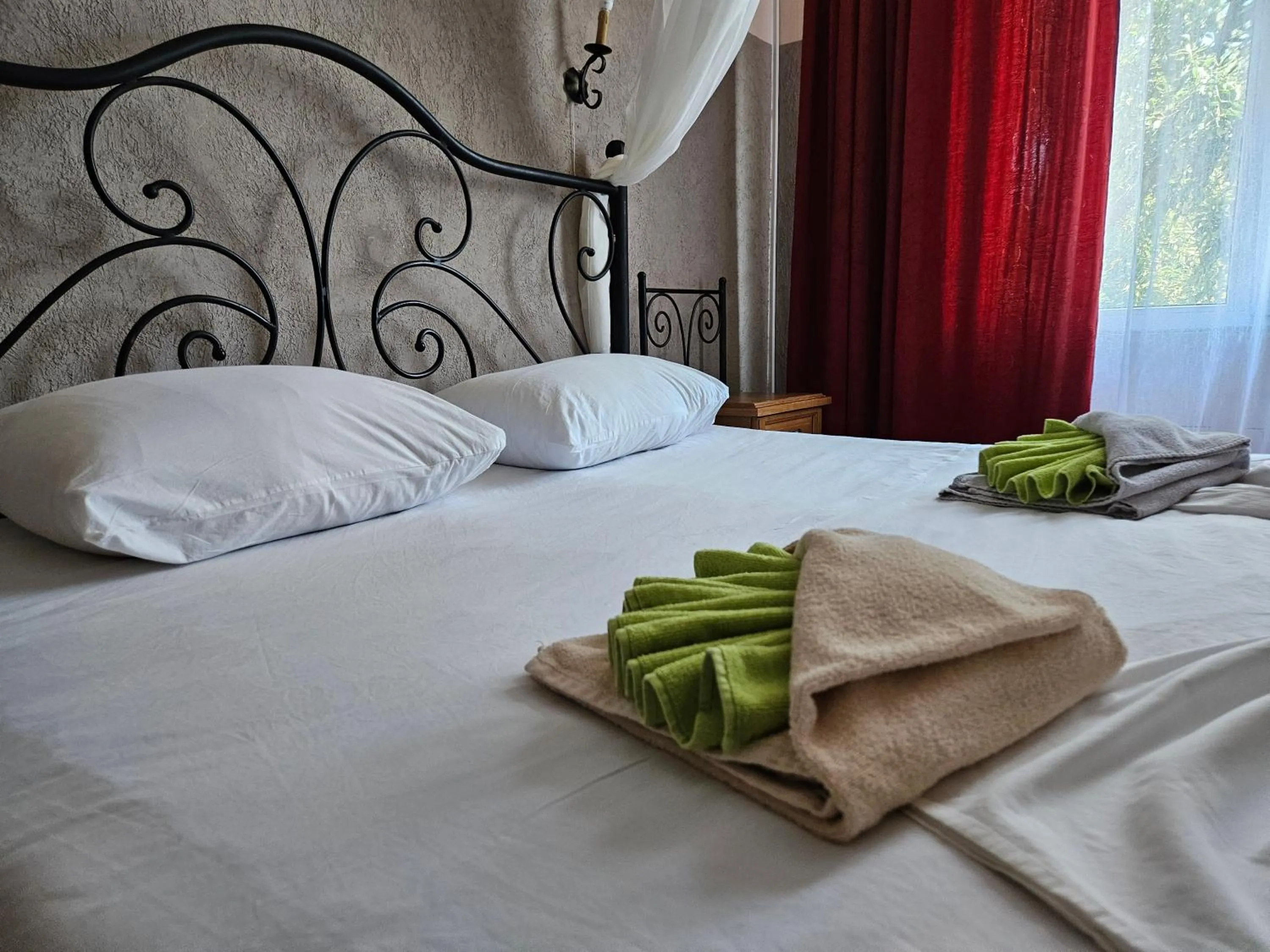 Bed in Paralax Hotel