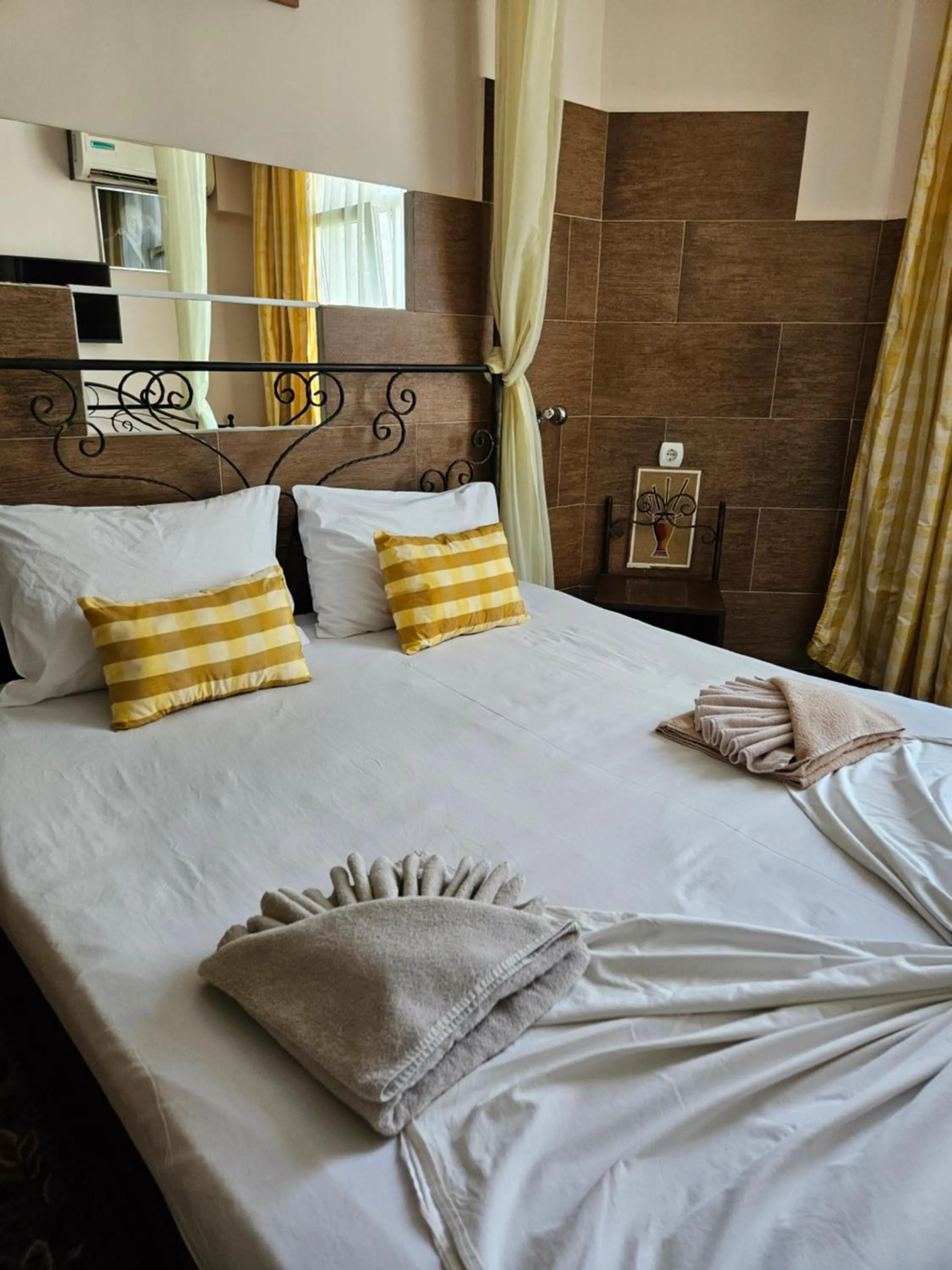 Bed in Paralax Hotel