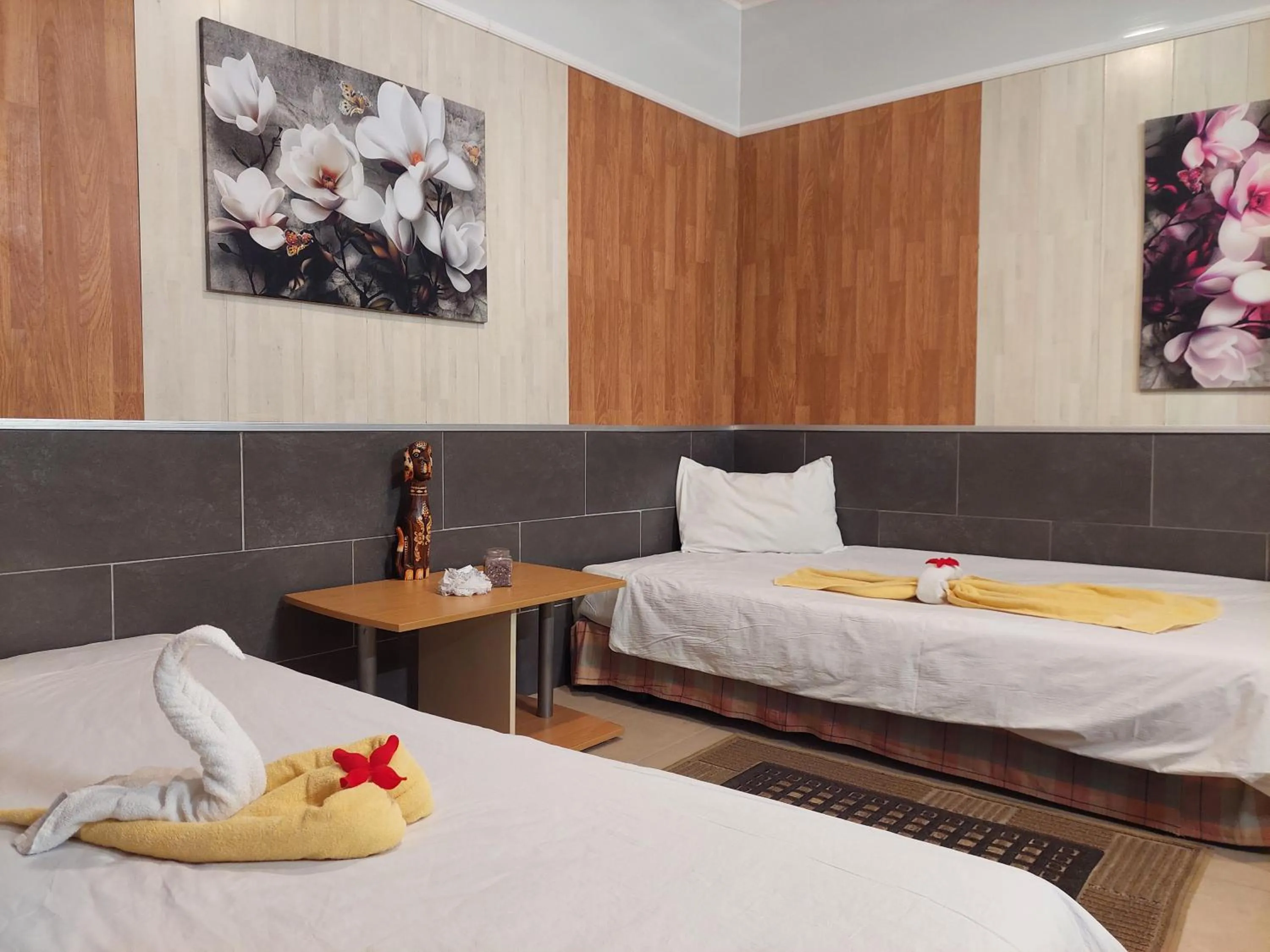 Bed in Paralax Hotel