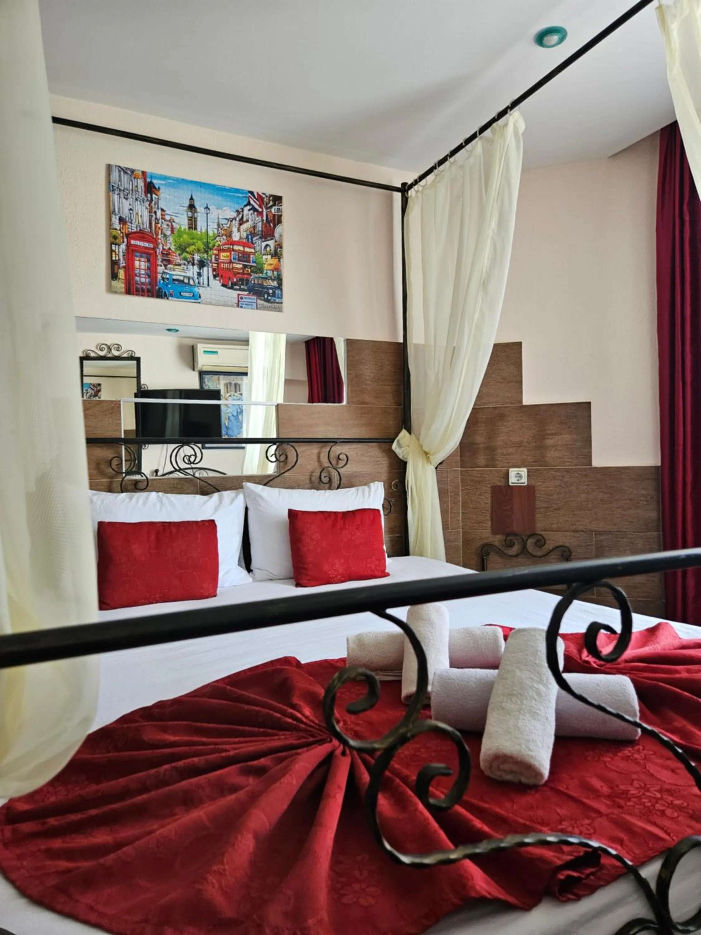 Bed in Paralax Hotel