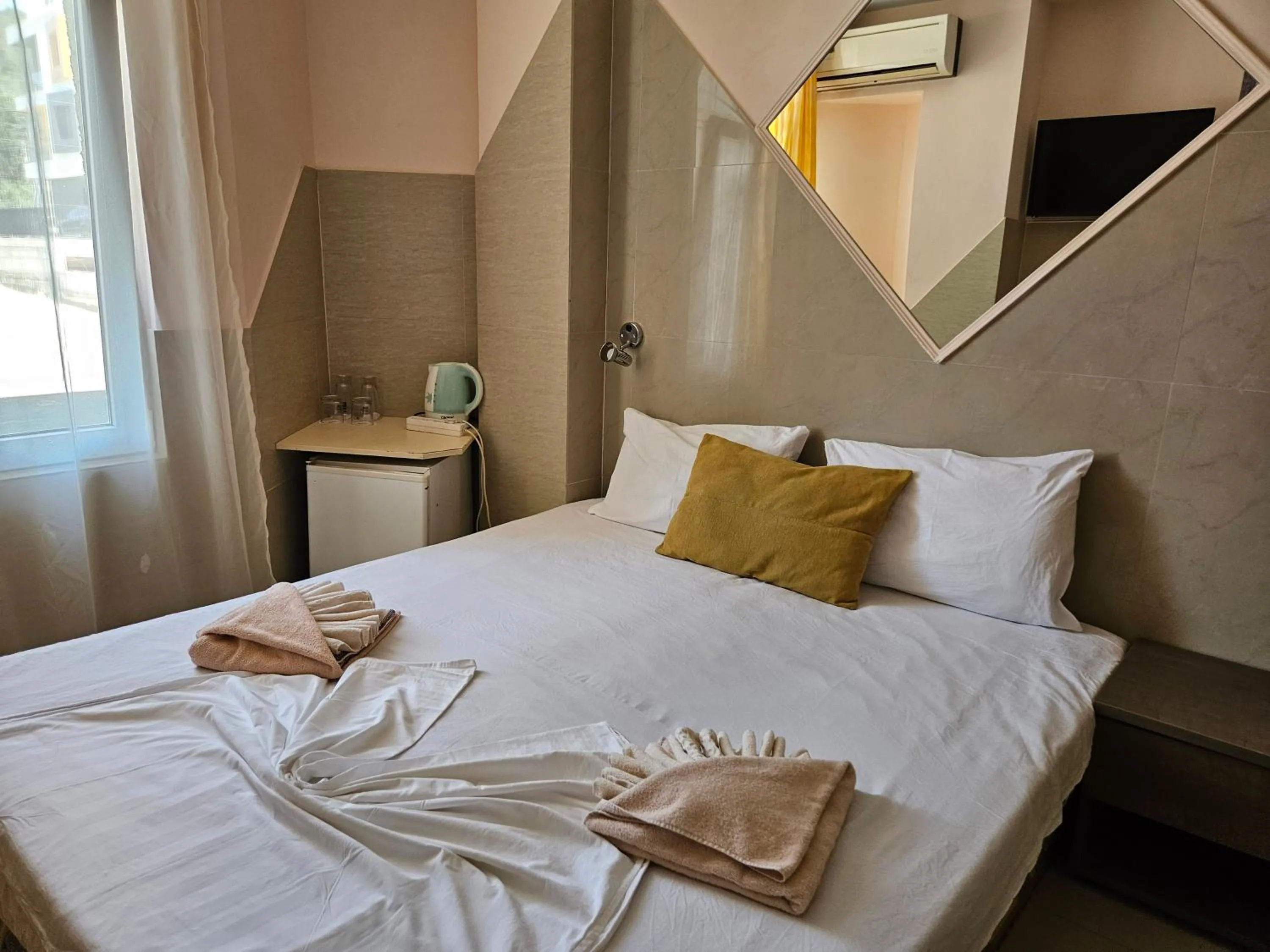 Bed in Paralax Hotel