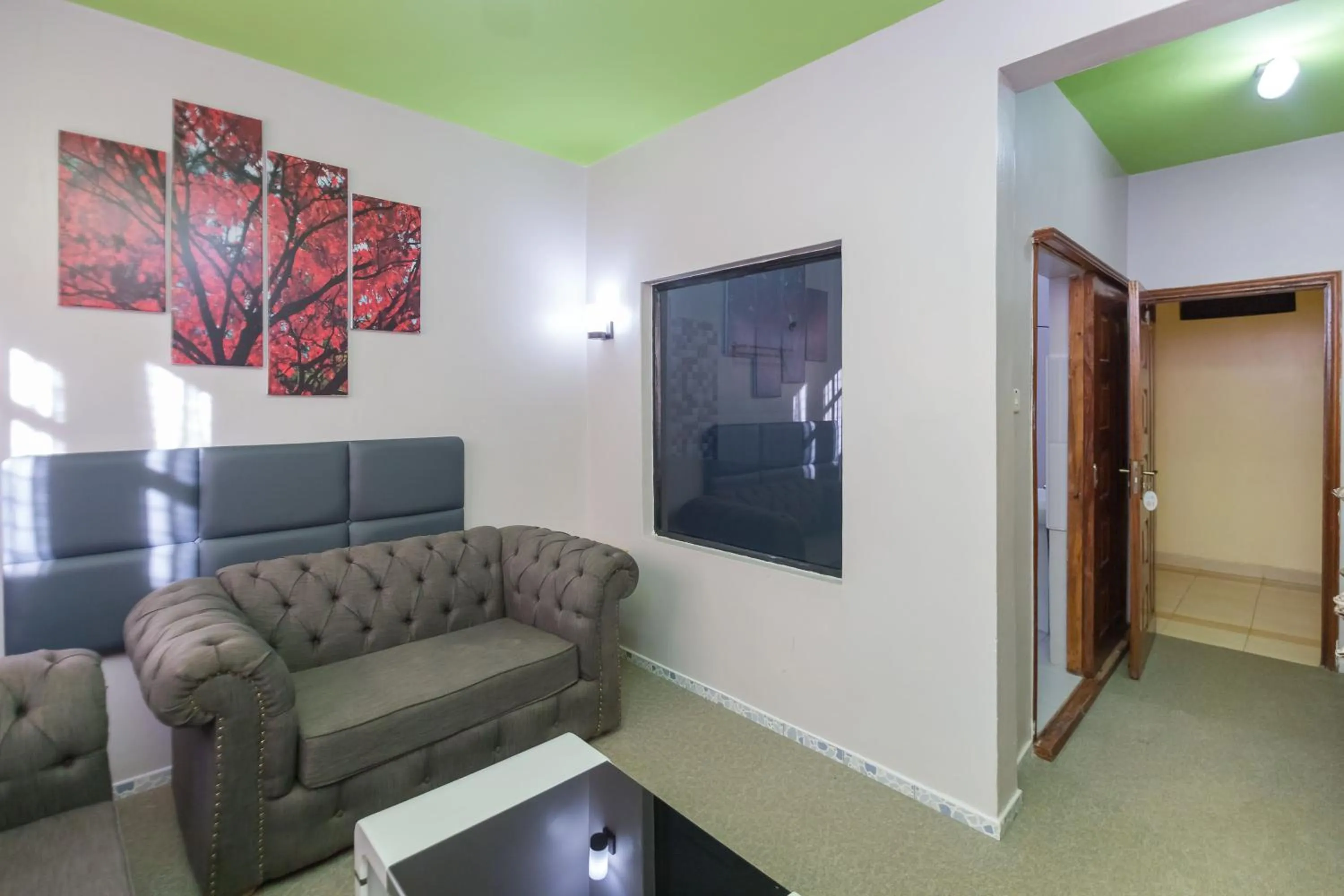Seating area in Maple Inn Hotel