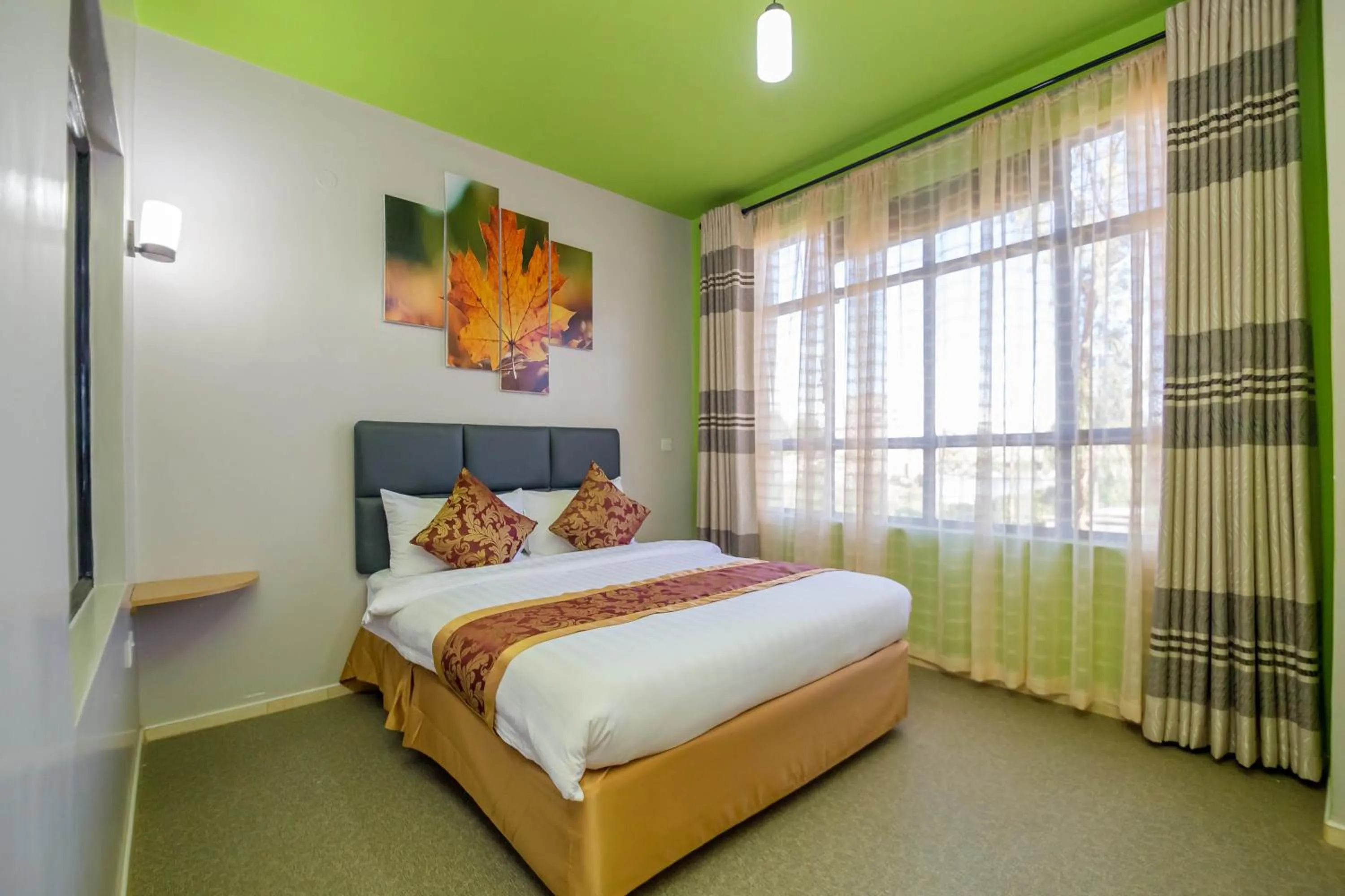 Photo of the whole room, Bed in Maple Inn Hotel