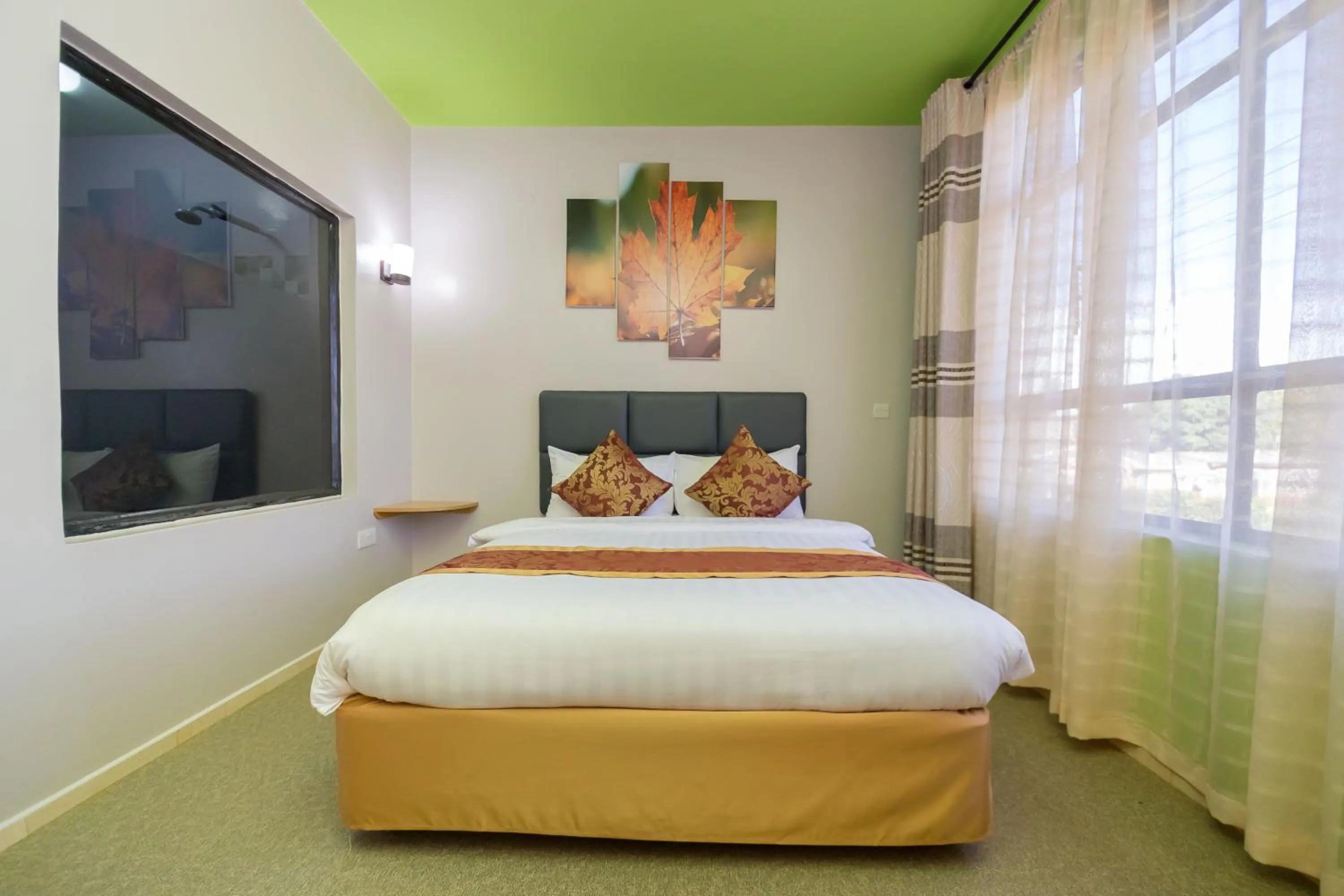 Photo of the whole room, Bed in Maple Inn Hotel