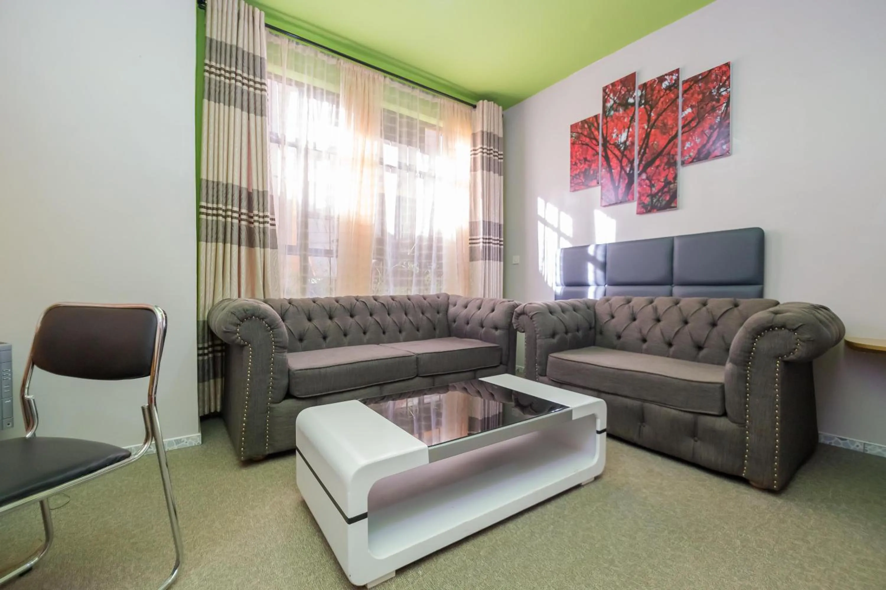 Seating area in Maple Inn Hotel