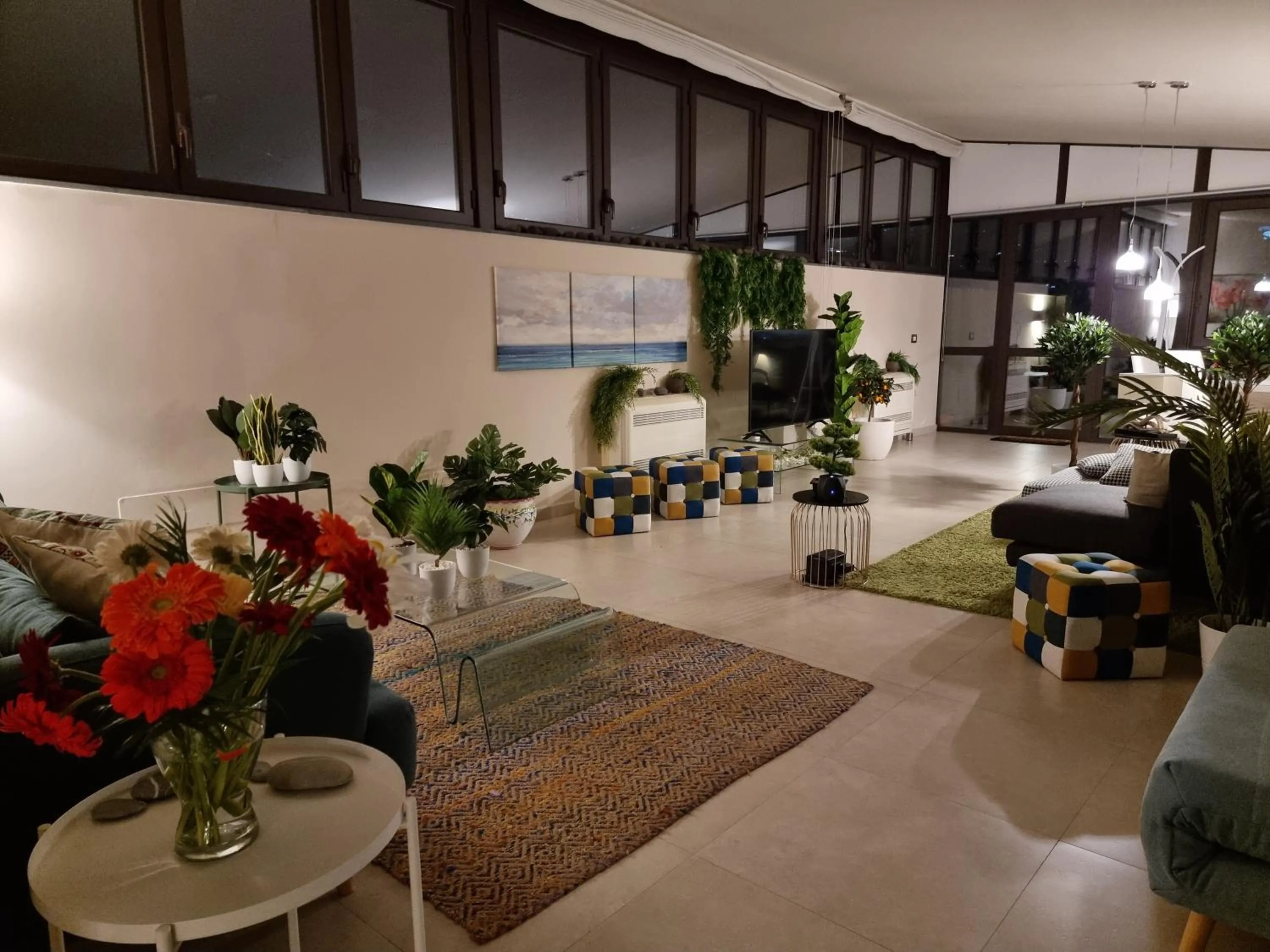 Living room in Luxury Panoramic Loft with heated pool near Catania, Taormina, the Sea and Mount Etna by SicilianRelaxingHomes
