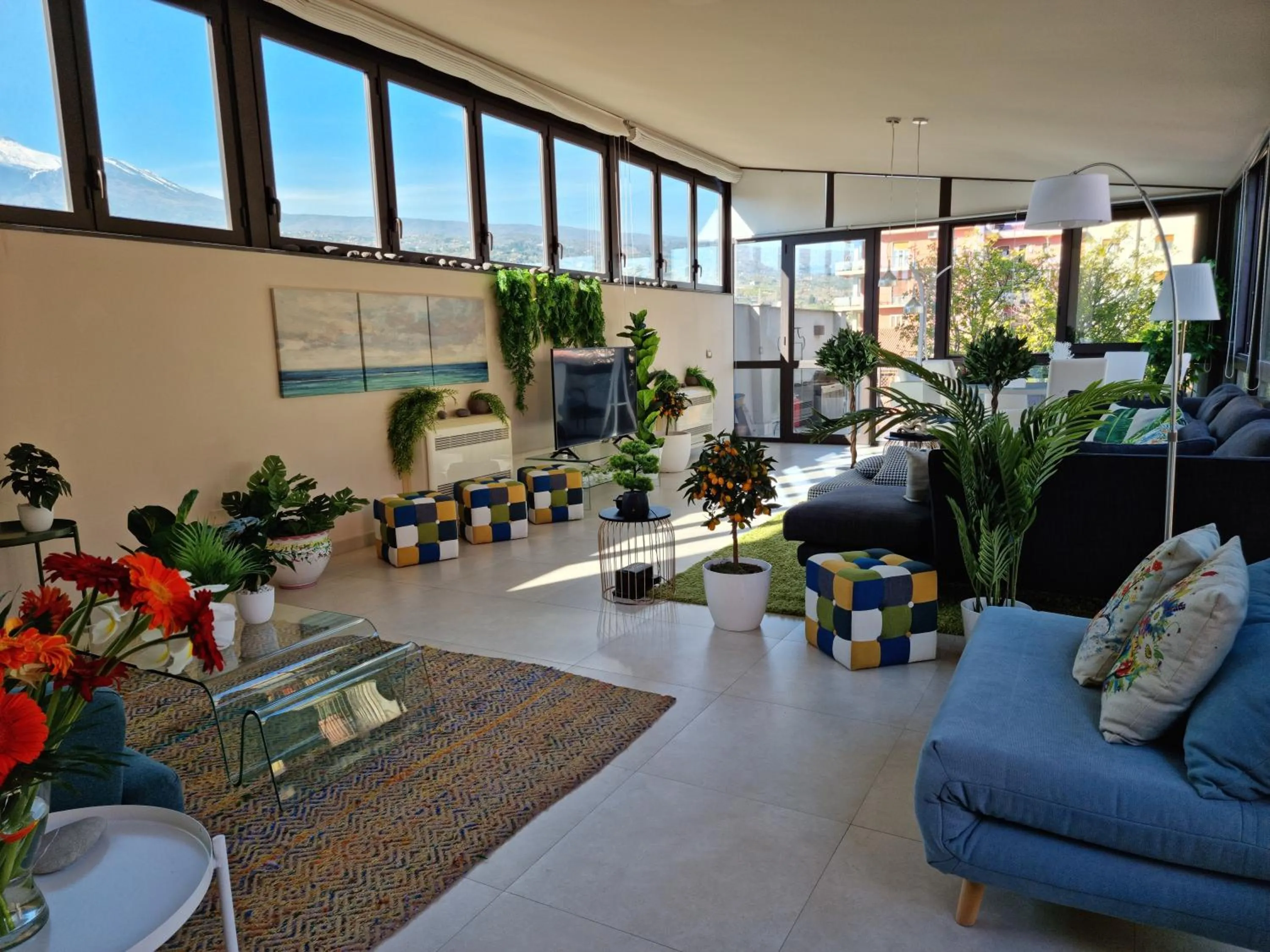 Living room in Luxury Panoramic Loft with heated pool near Catania, Taormina, the Sea and Mount Etna by SicilianRelaxingHomes
