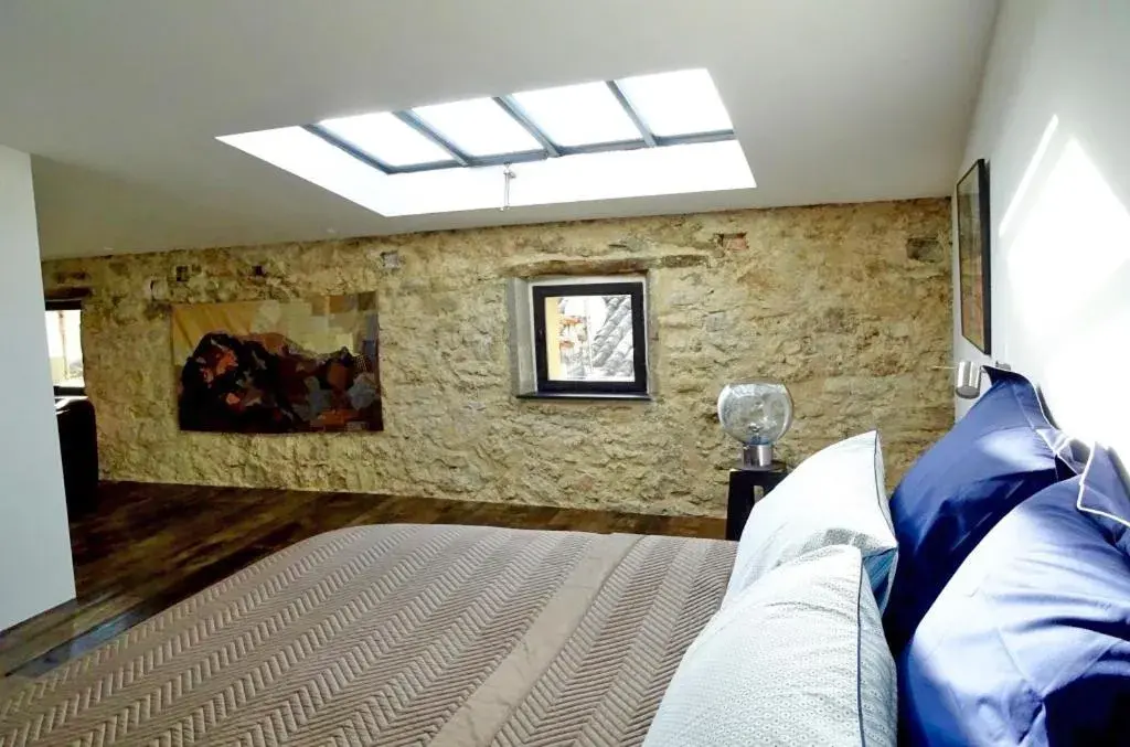 Bed in Demeure d'hôtes Le Rocher Bed in Demeure d'hôtes Le Rocher