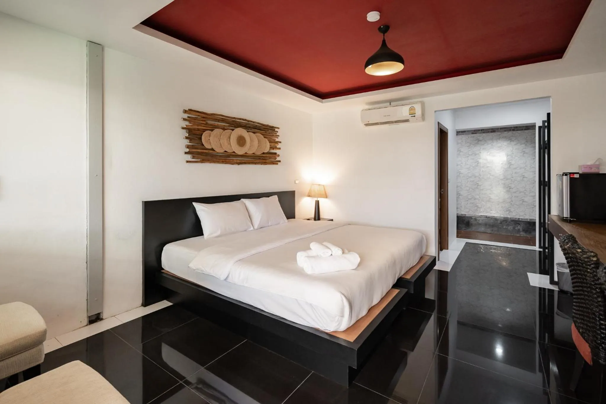 Bed in The Loft Panwa Resort