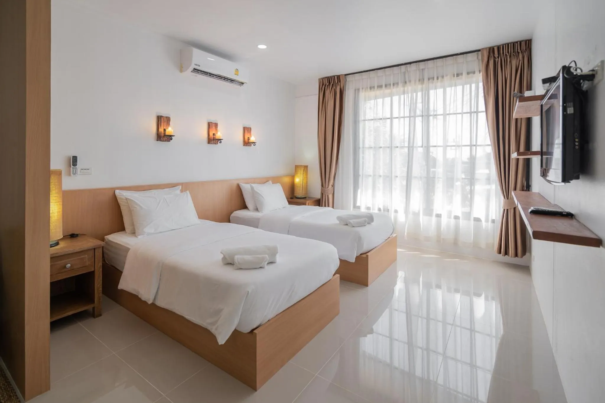 TV and multimedia, Bed in The Loft Panwa Resort