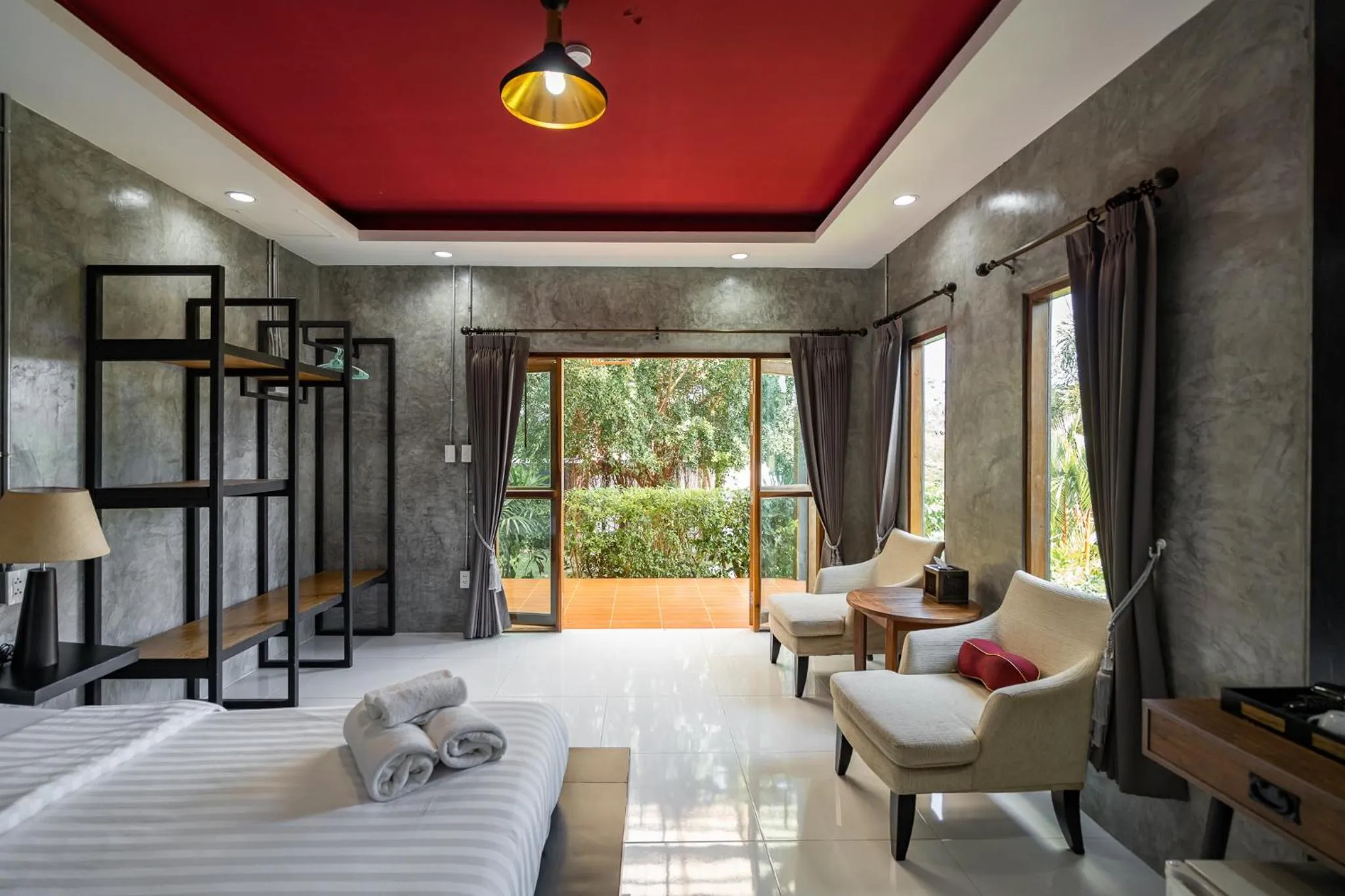 Bed in The Loft Panwa Resort