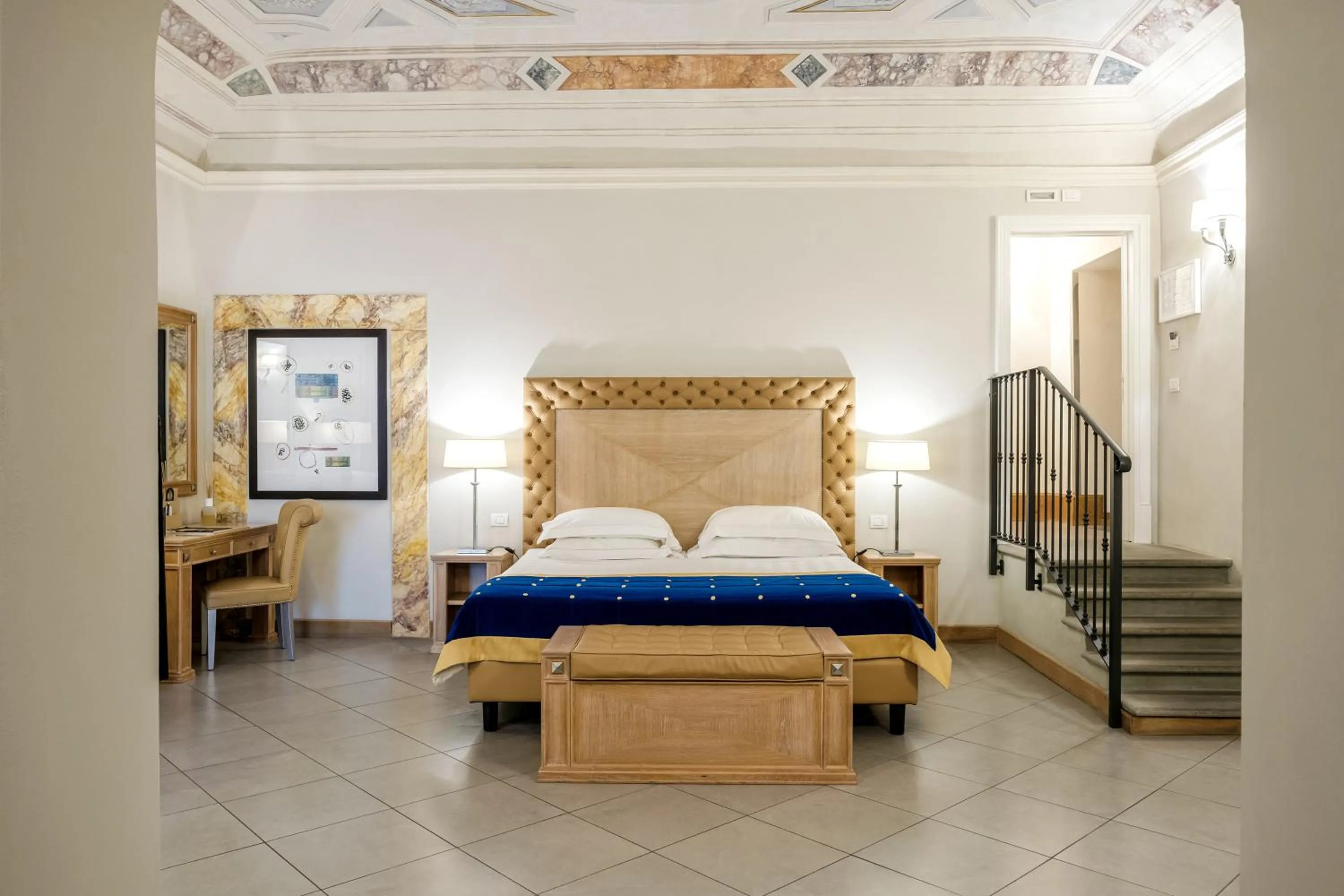 Bed in Villa Tolomei Hotel & Resort