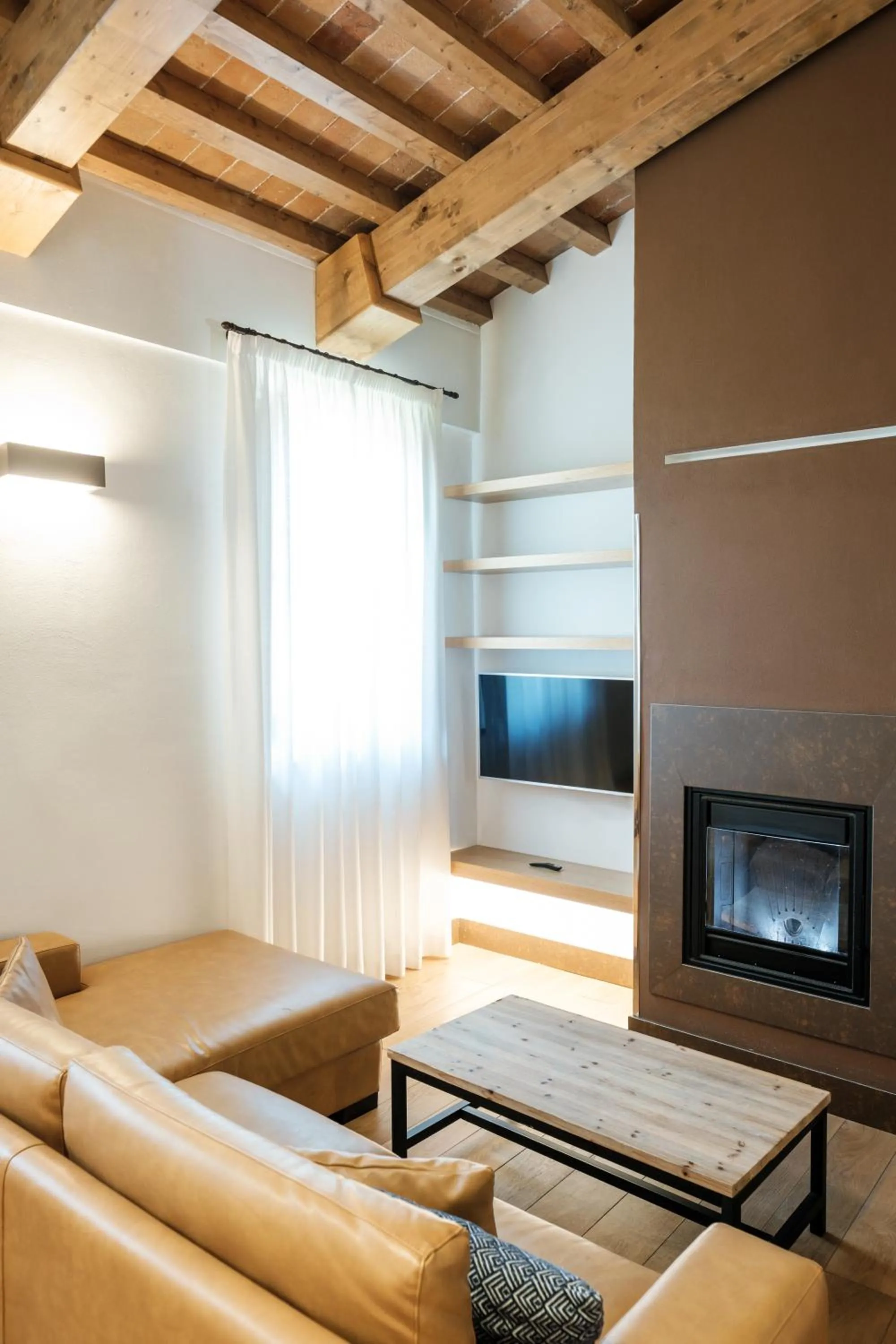 Communal lounge/ TV room in Villa Tolomei Hotel & Resort