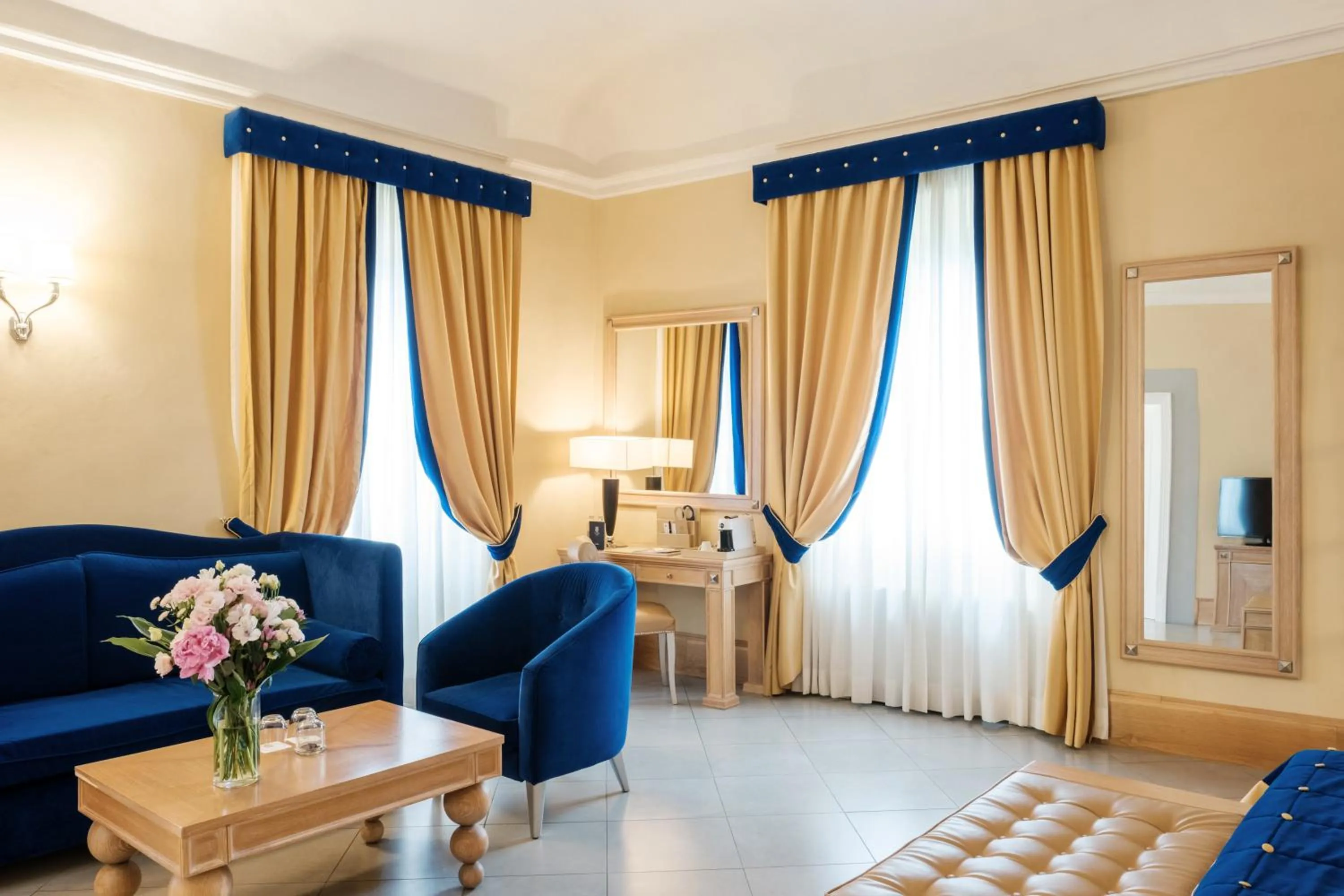 Bed in Villa Tolomei Hotel & Resort