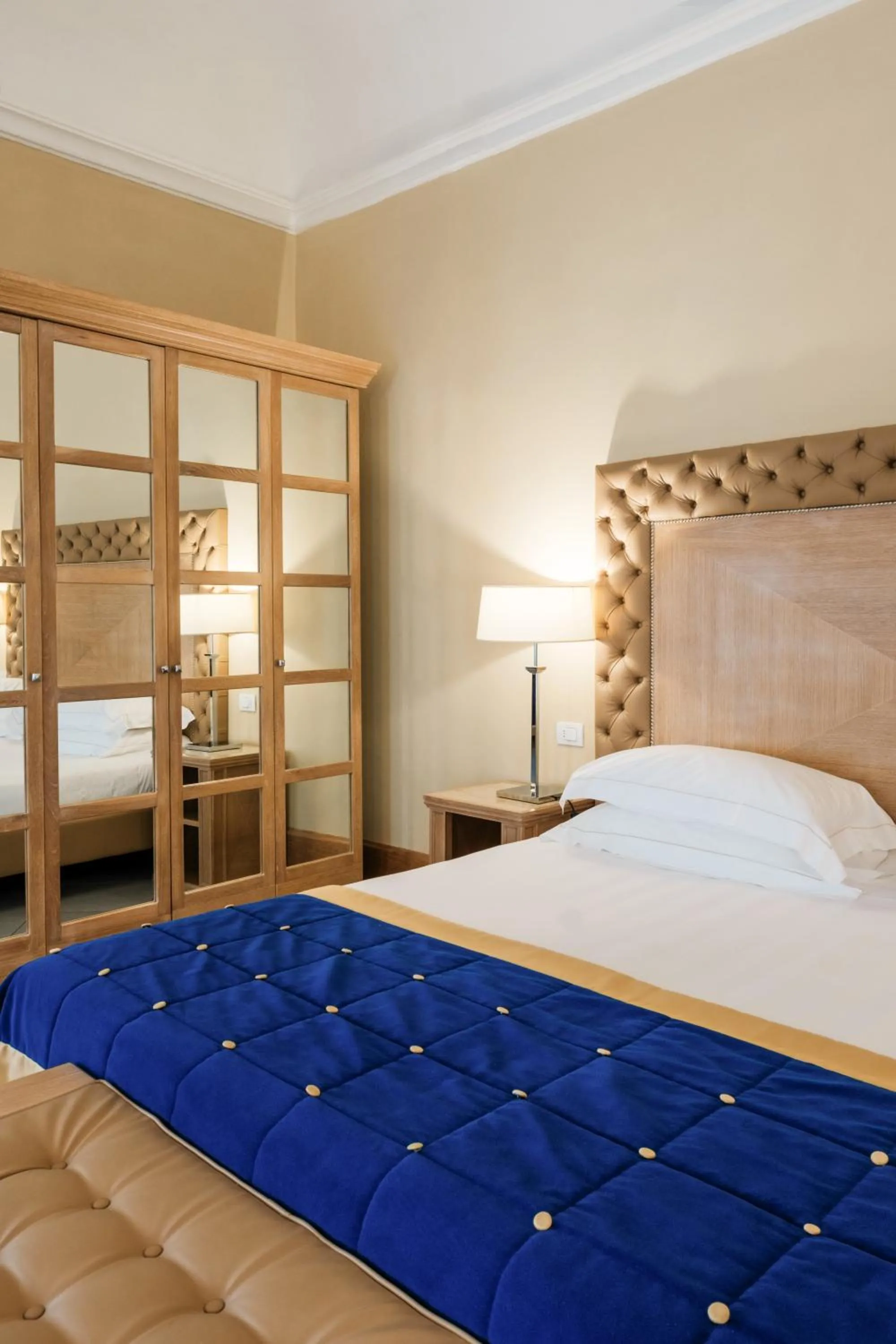 Bed in Villa Tolomei Hotel & Resort