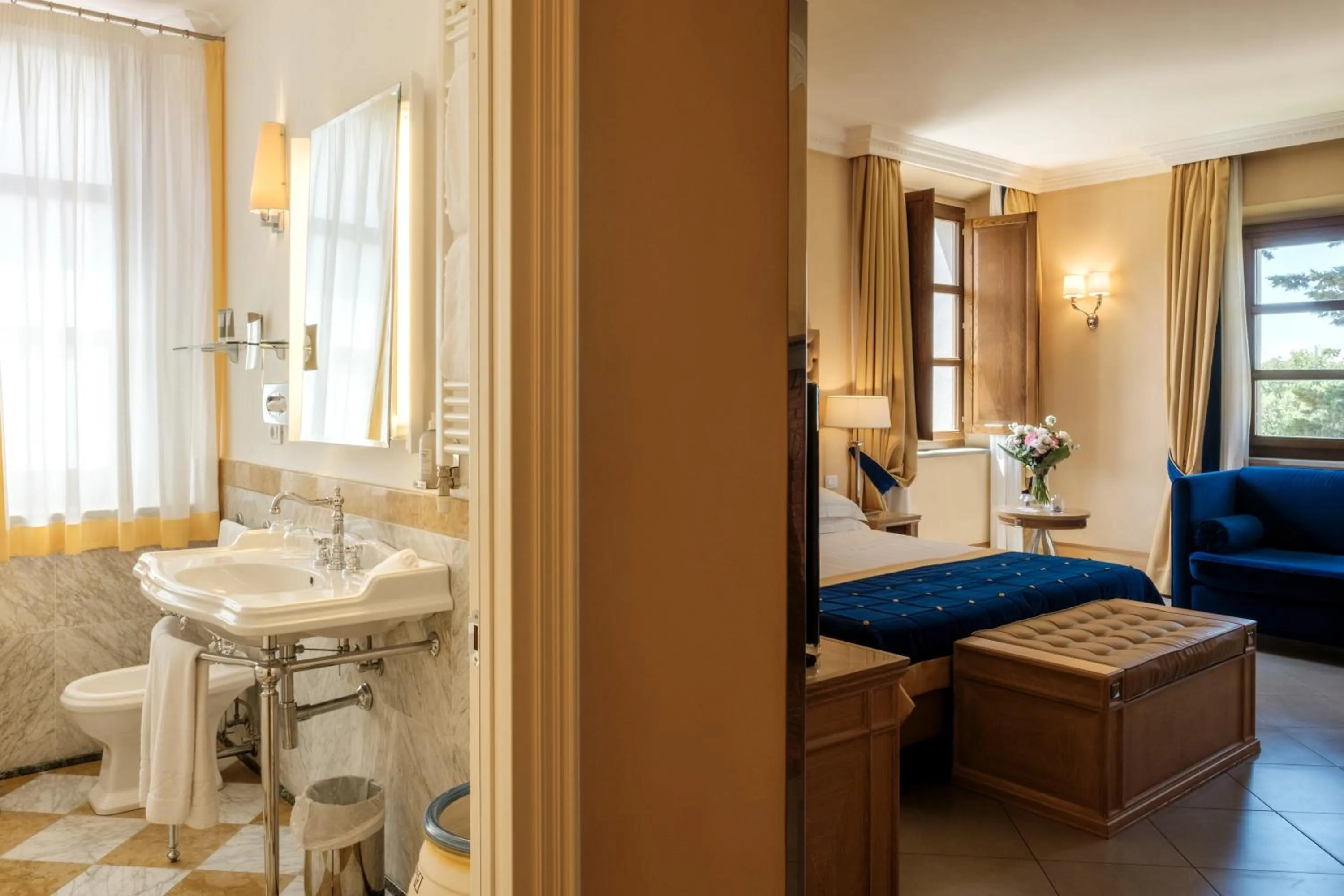 Bed in Villa Tolomei Hotel & Resort