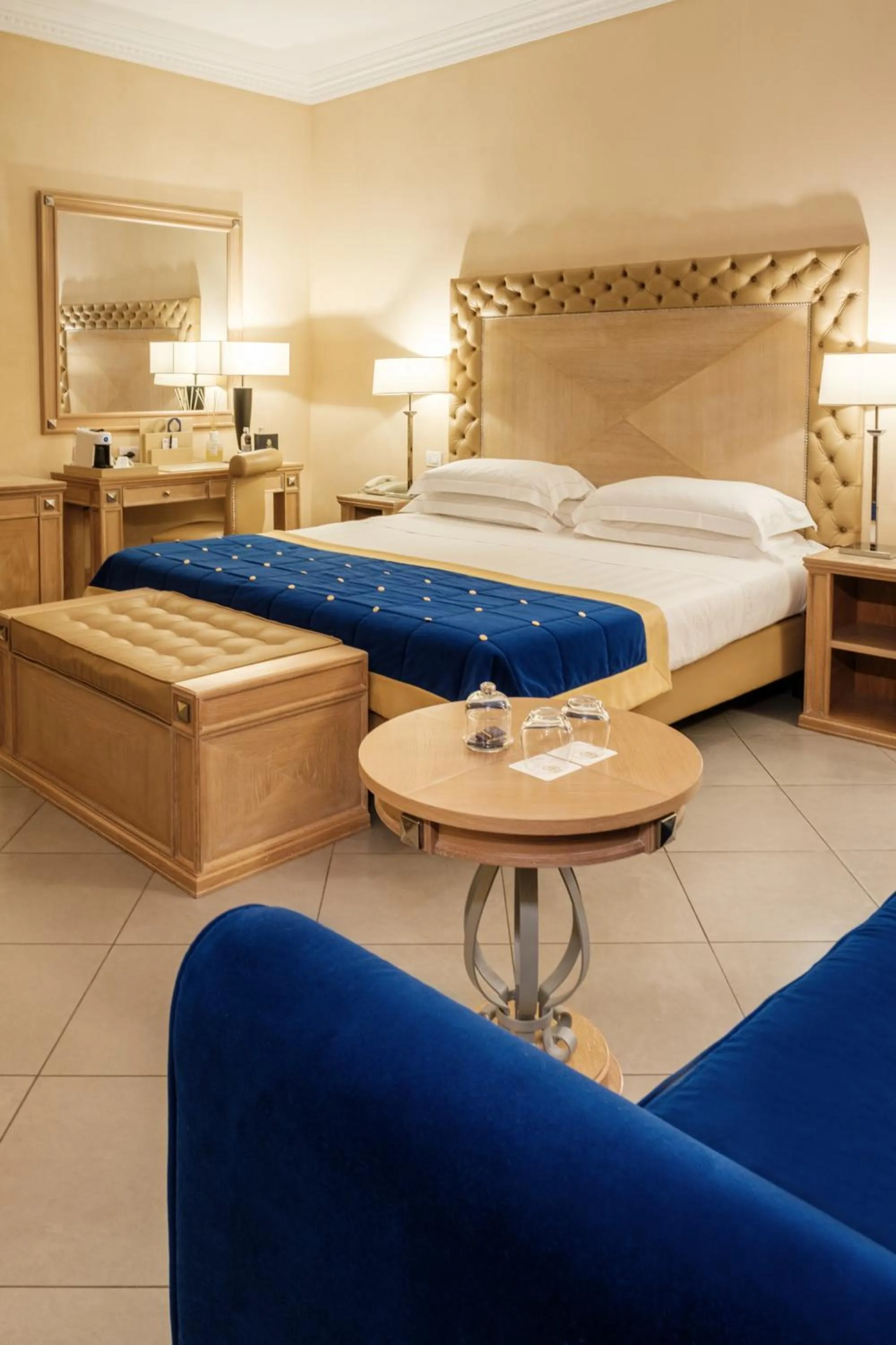 Bed in Villa Tolomei Hotel & Resort