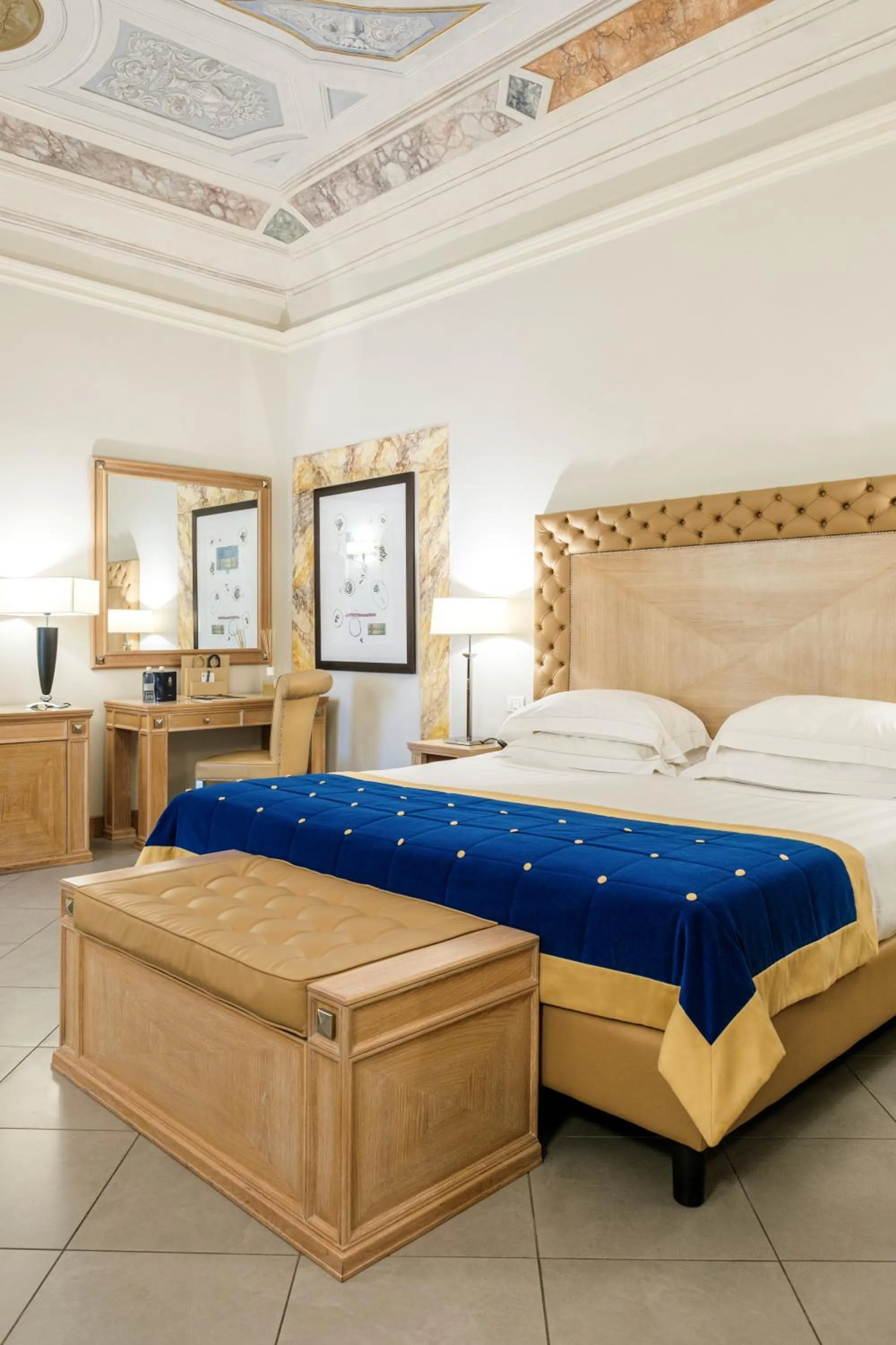 Bed in Villa Tolomei Hotel & Resort