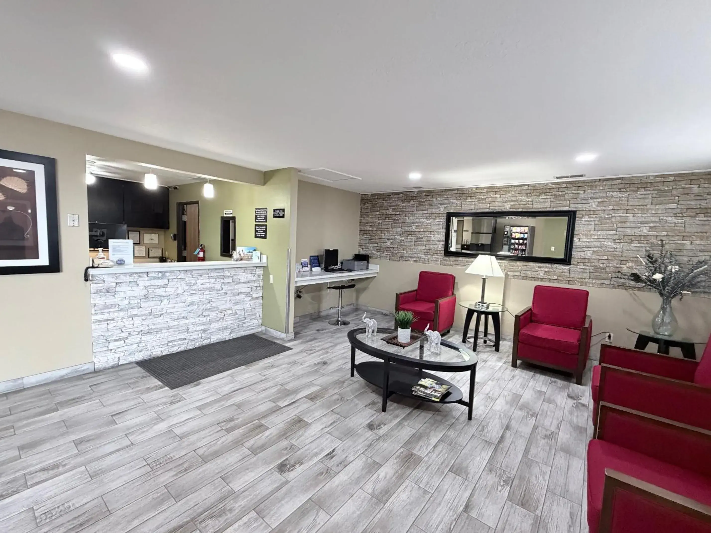 Lobby or reception in Super 8 by Wyndham Logan Lobby or reception in Super 8 by Wyndham Logan