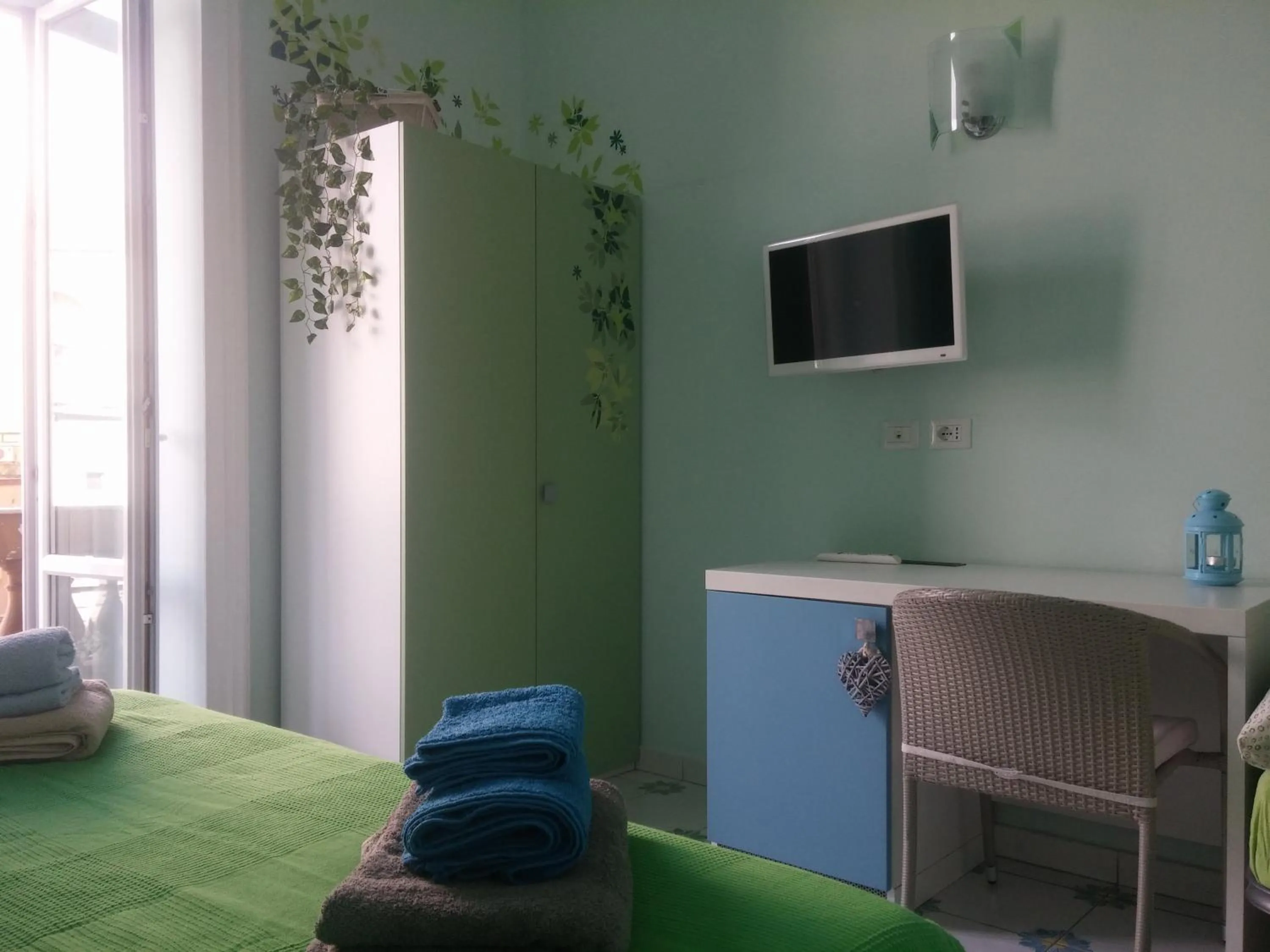 Photo of the whole room in Viaggio a Napoli B&B