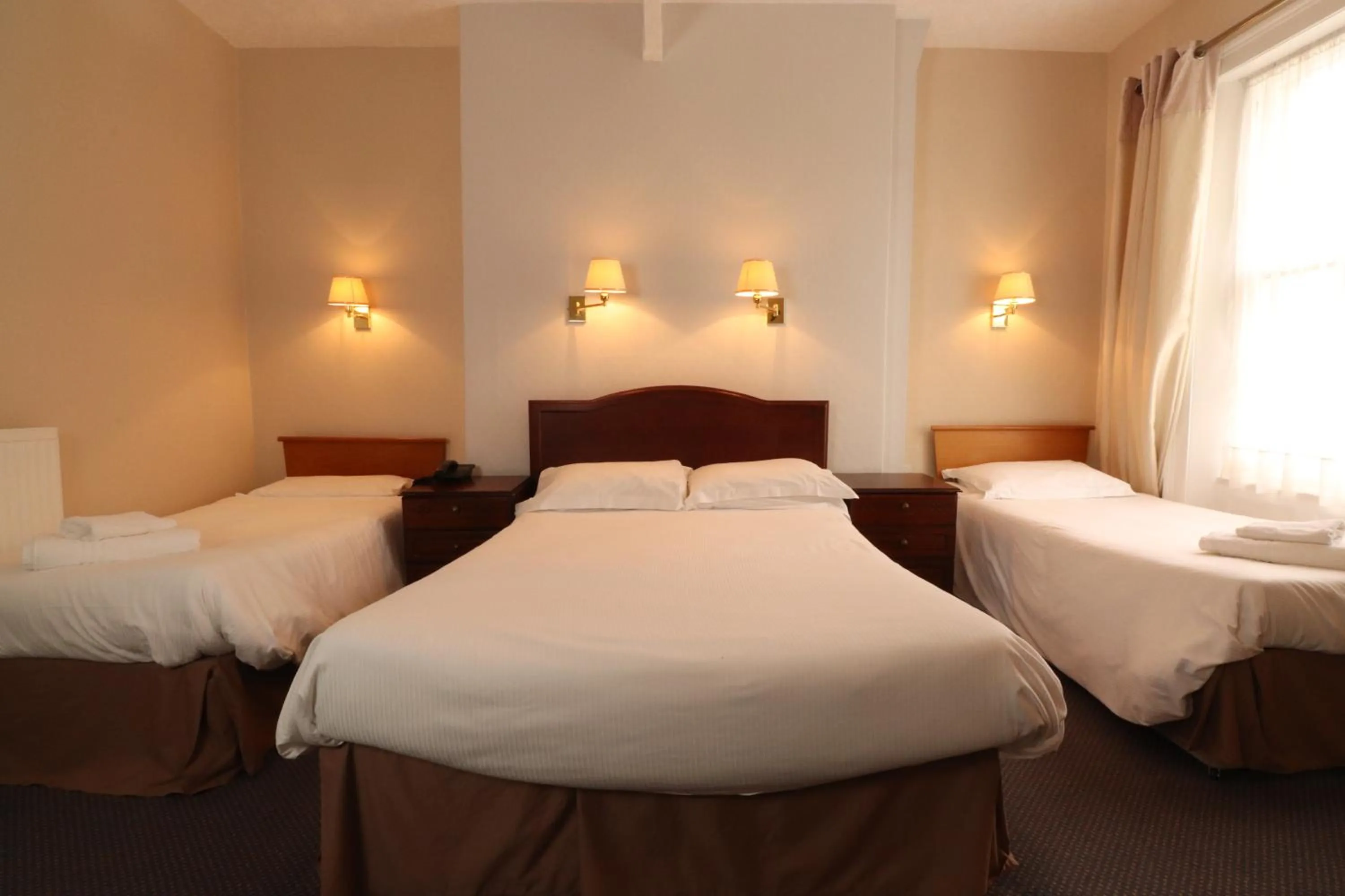 Photo of the whole room, Bed in The Esplanade Hotel