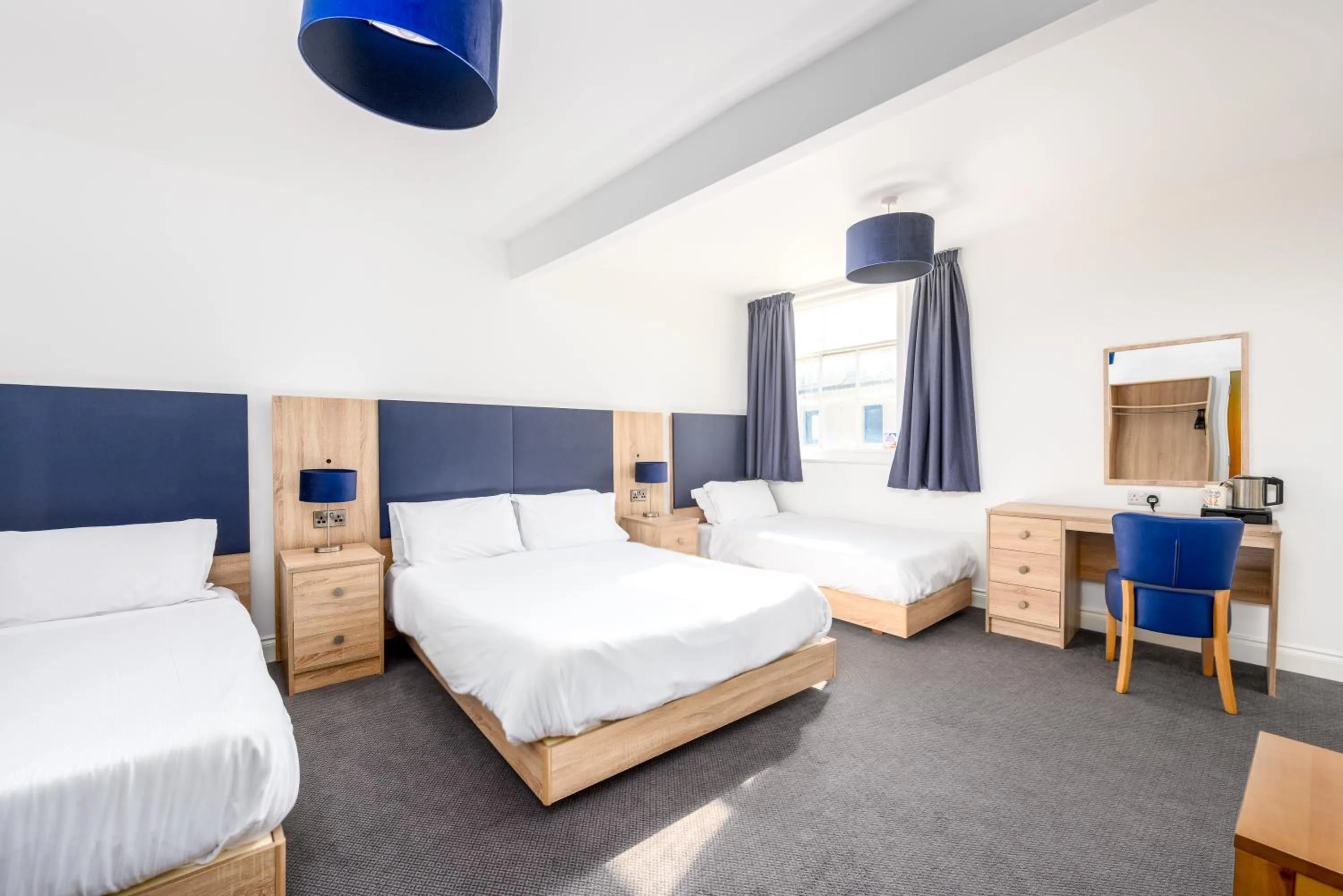 Bed in The Esplanade Hotel